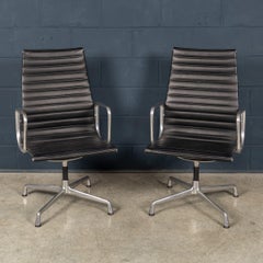 20thC Pair Of Ea117 Chairs In Black Leather By Charles & Ray Eames For Vitra