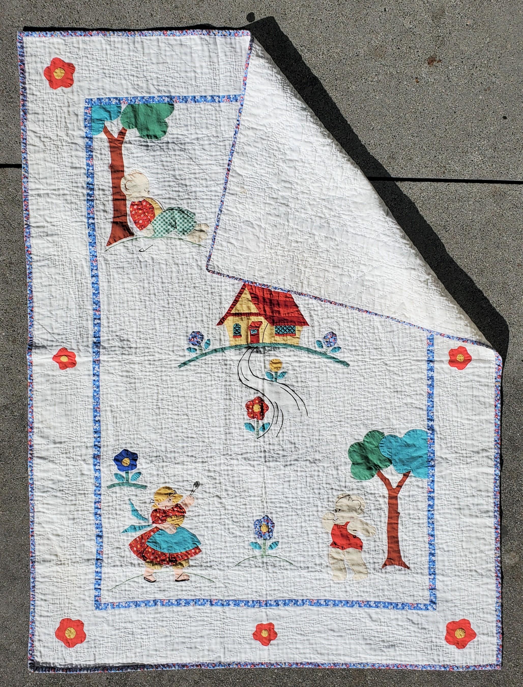 This fun pictorial crib quilt is from the forties and in good condition.