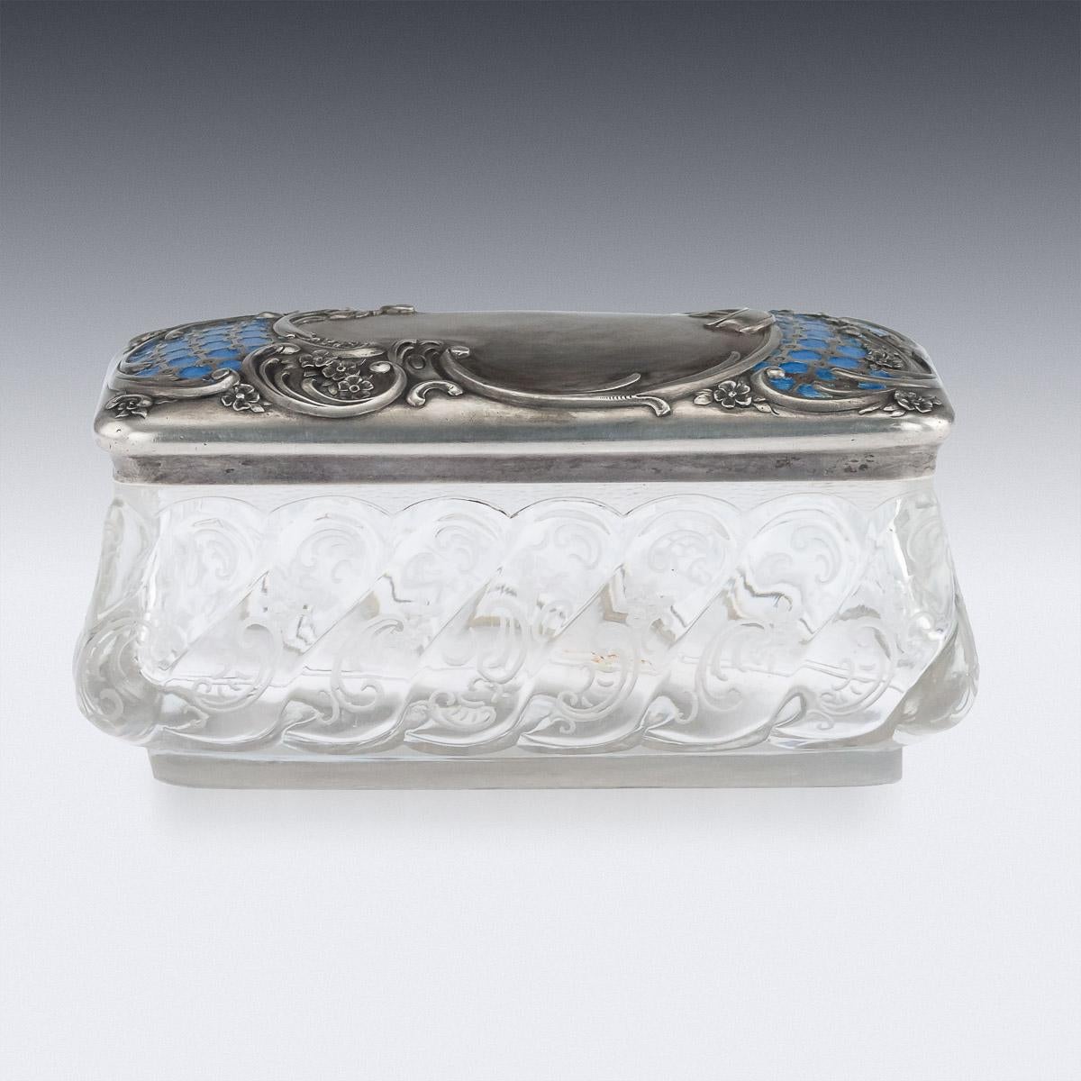Antique early 20th century Russian Faberge enameled solid silver and rock crystal vanity box, the rectangular Rococo style lid, elaborate in design with scrolls and flowers, beautifully part enameled and gilded on reverse. The hand carved rock
