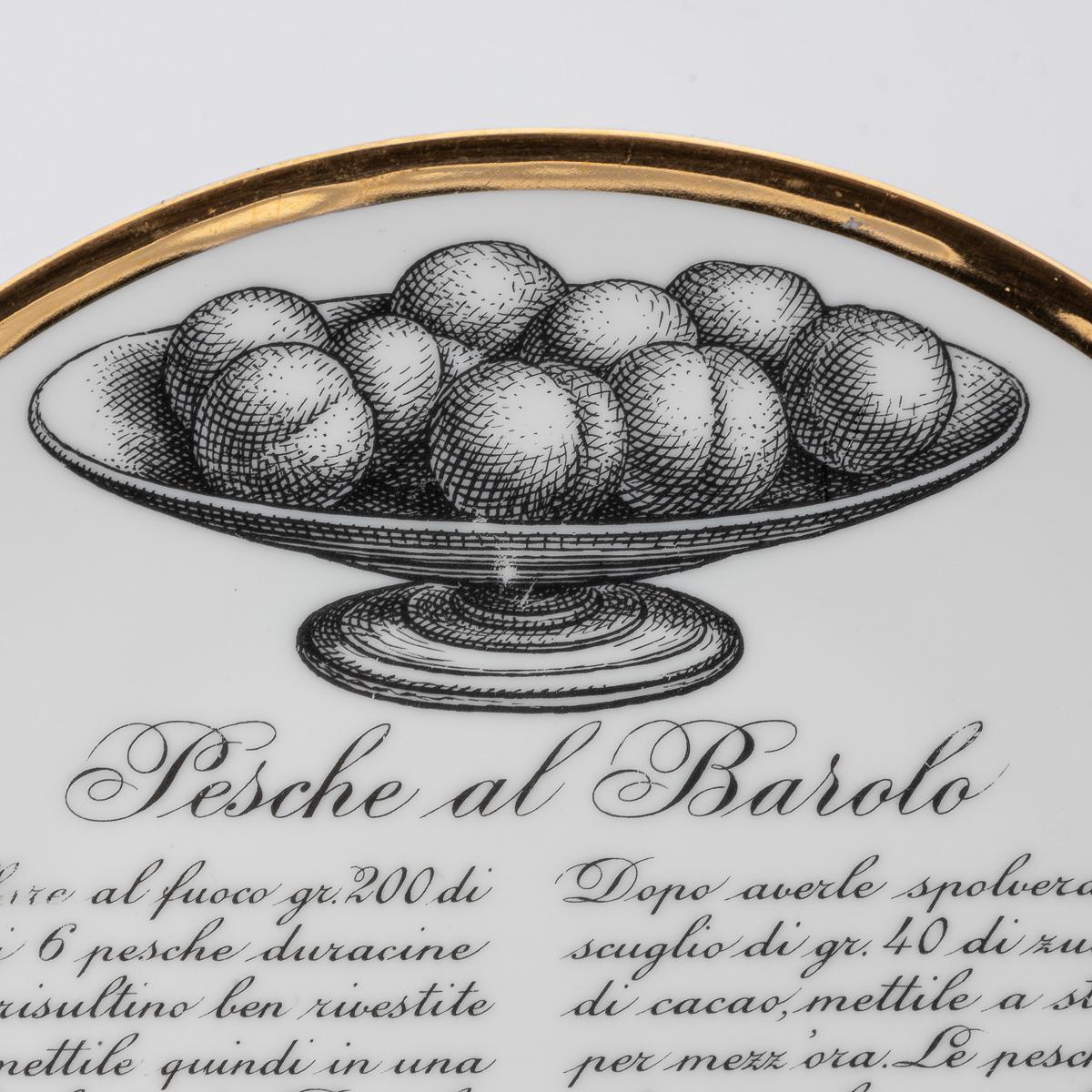 A charming and rare set of four porcelain plates, created by Piero Fornasetti in the 1950s, specially commissioned by Fiat to celebrate the culinary and cultural traditions of Turin. Each plate features Fornasetti's unmistakable blend of wit,