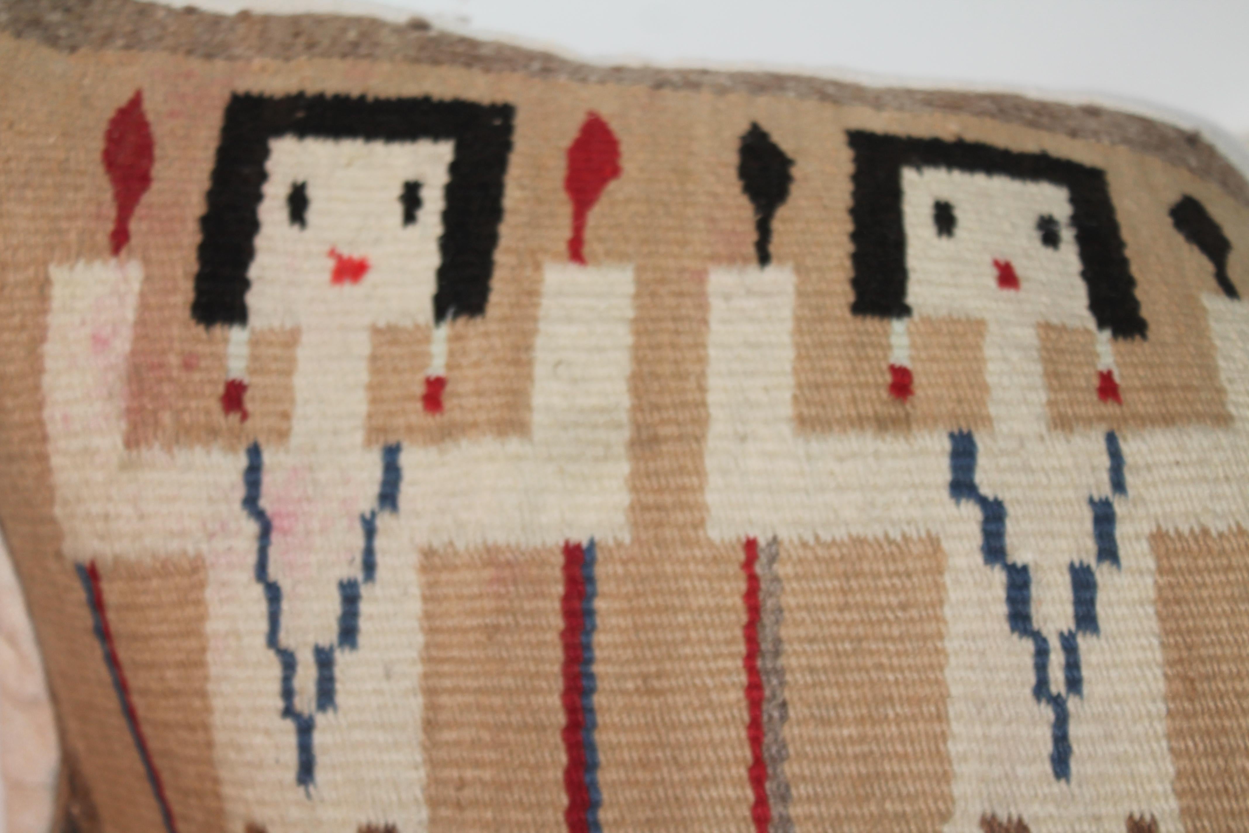 20Thc Native American Yei Indian weaving bolster pillow. The backing is in cotton linen homespun fabric. The insert is down & feather fill.