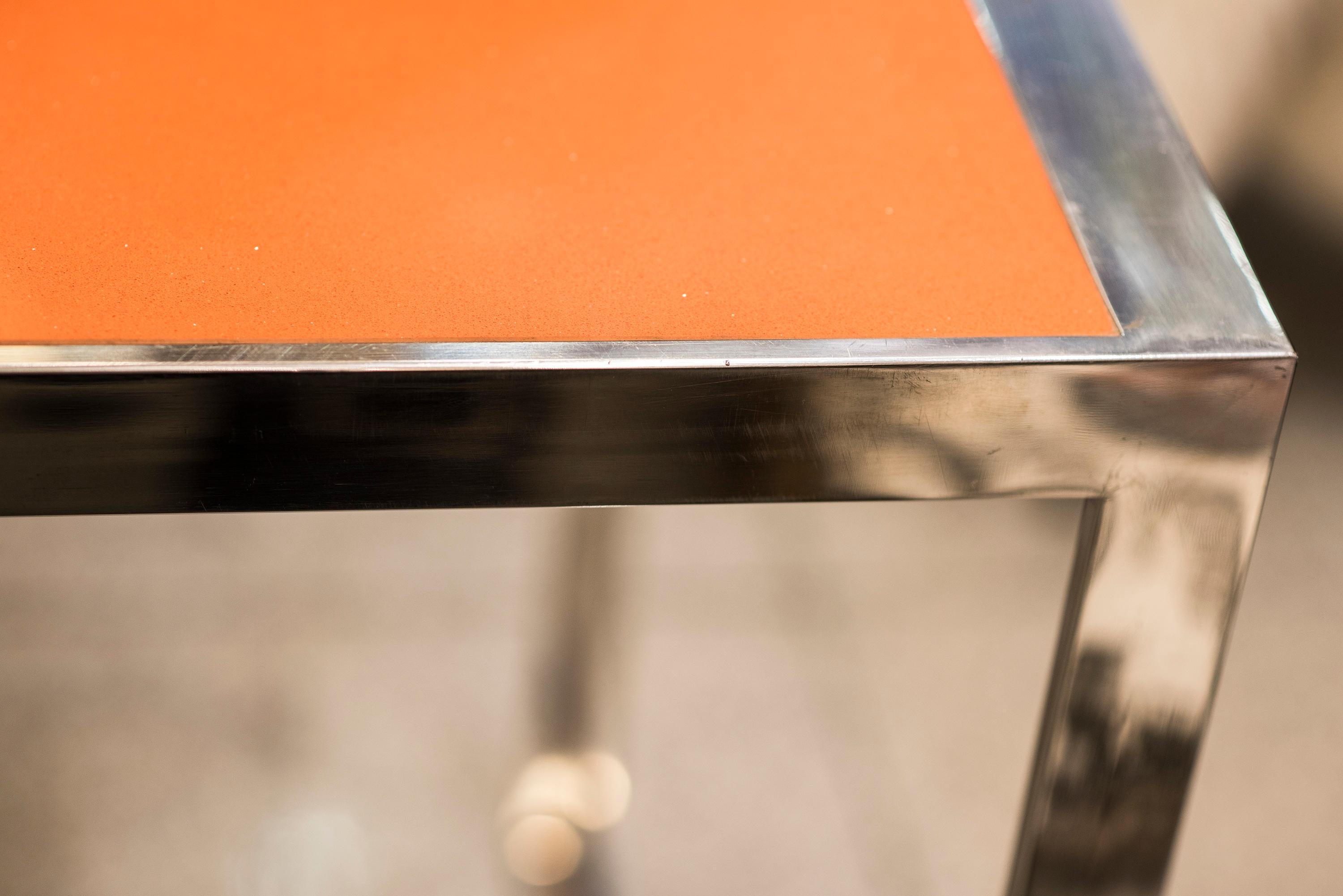 Beautiful per Arnoldi style Italian console table or dining table in chrome steel and orange quartz. Midcentury, circa 1970.
A touch of colour in anywhere, as a console table or as a dining table for a big office in the kitchen.
Maybe the orange