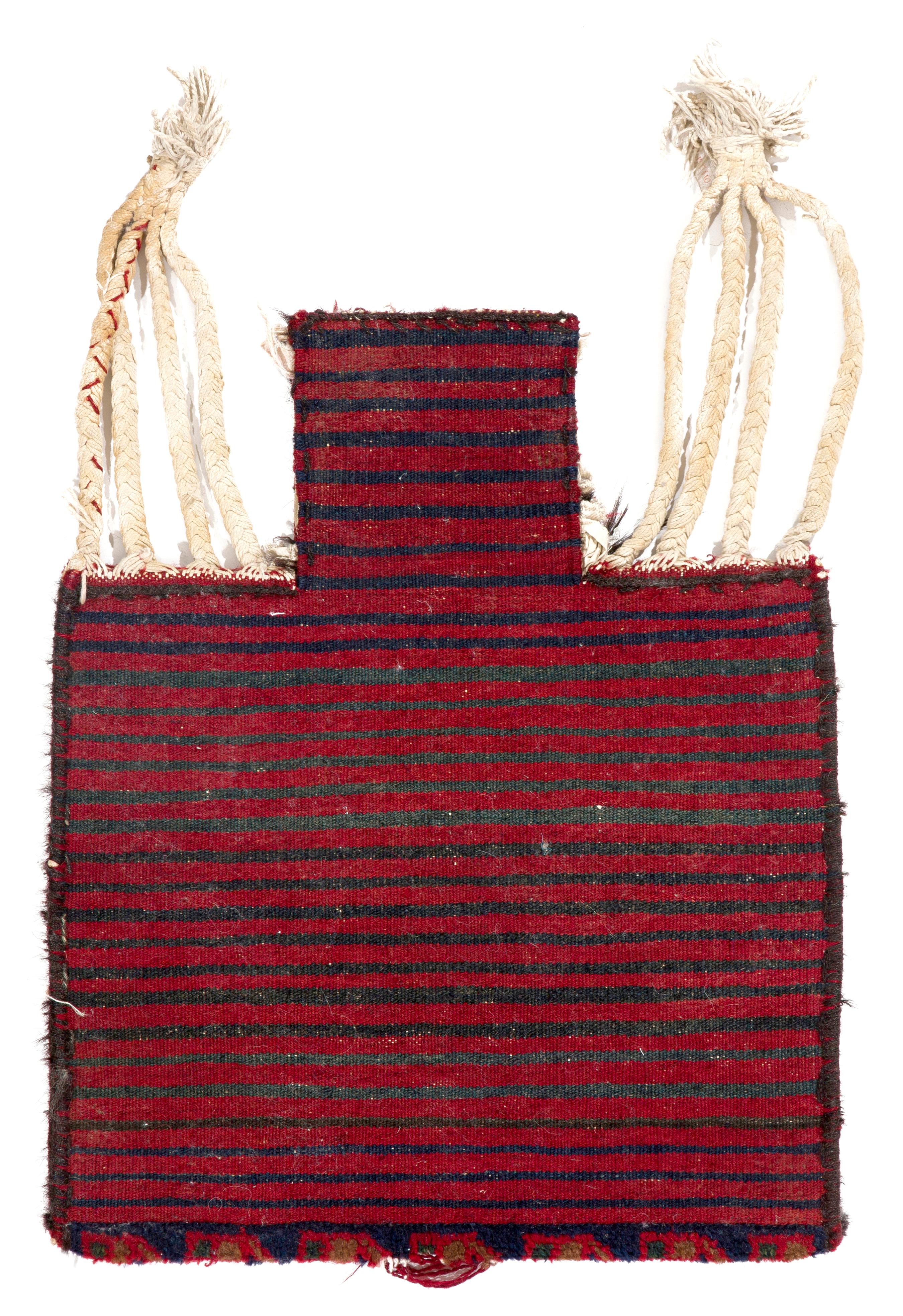 A vintage Turkish salt bag is a traditional textile item that was historically used to transport and store salt in Turkey. These bags are typically made from coarse, durable fabrics such as burlap or canvas, and are decorated with colorful geometric
