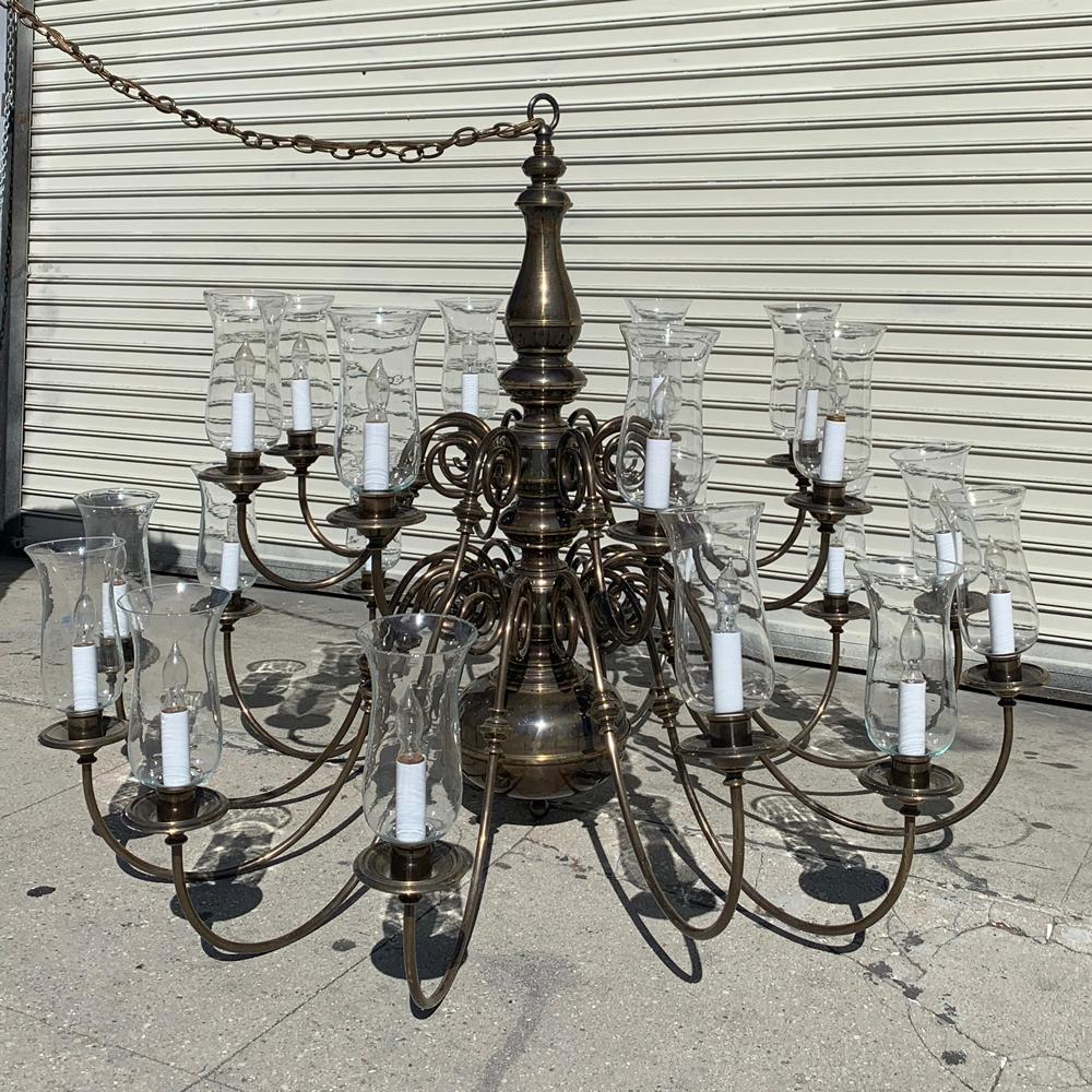 Beautiful chandelier with 21 arms made in solid brass, designed and manufactured in the USA by Feldman Lighting in the early 1980s.

The chandelier was installed at a church since it was ordered in the early 1980s and removed just a couple months