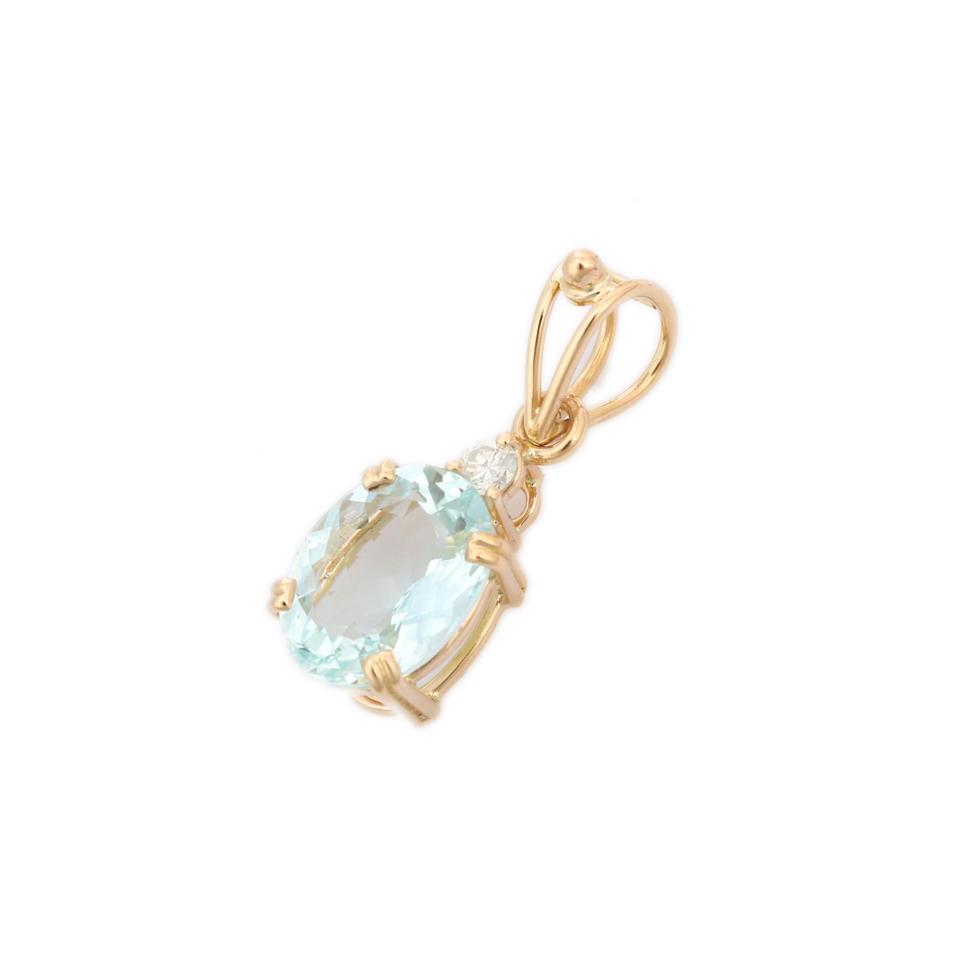 Aquamarine Diamond Pendant in 18K Gold oval cut aquamarine and round cut diamond studded in gold. This stunning piece of jewelry instantly elevates a casual look or dressy outfit. 
Aquamarine is useful for moving through transition and change.