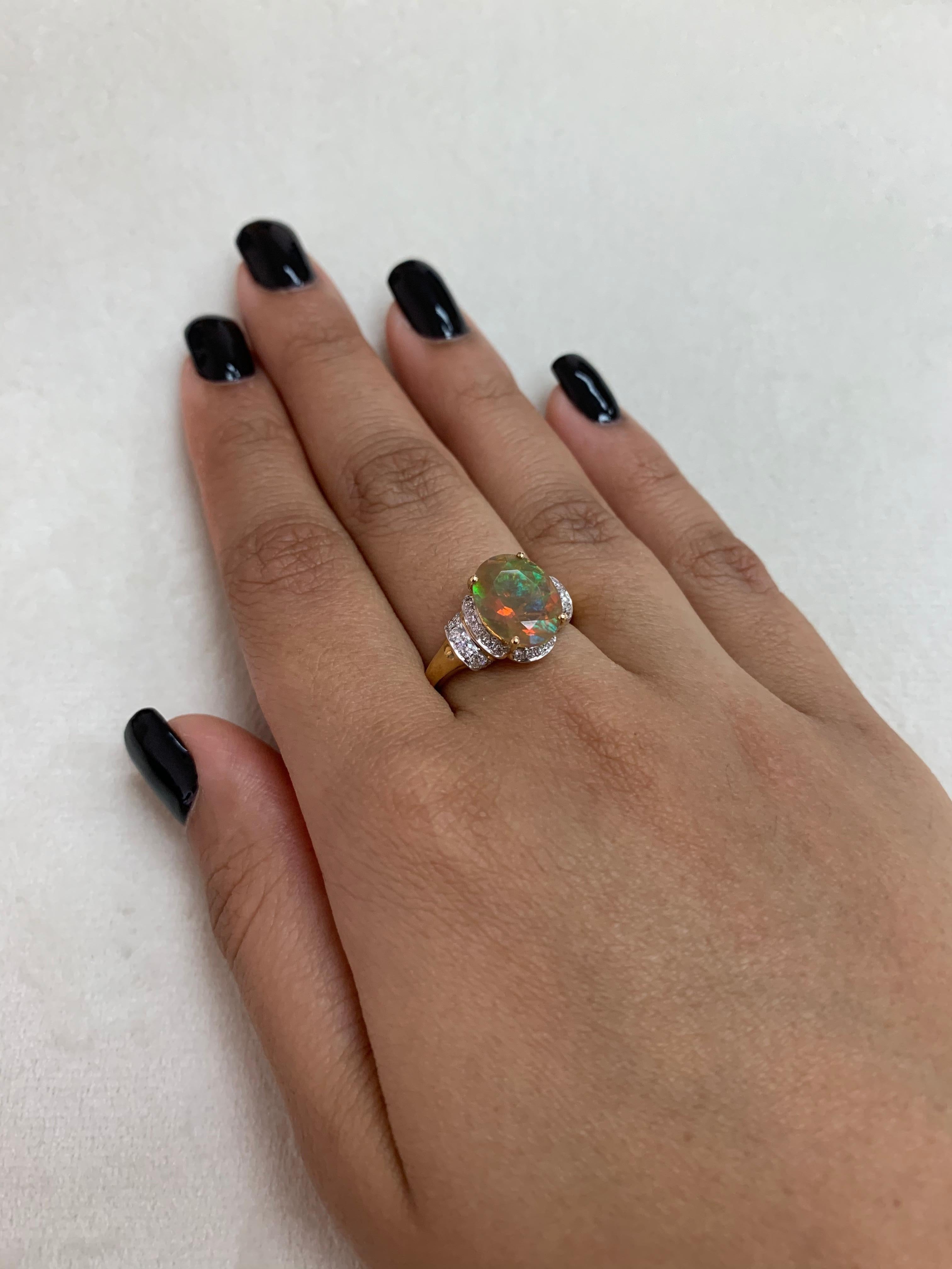 Contemporary 2.1 Carat Ethiopian Opal with Diamond Ring in 18 Karat Yellow Gold For Sale