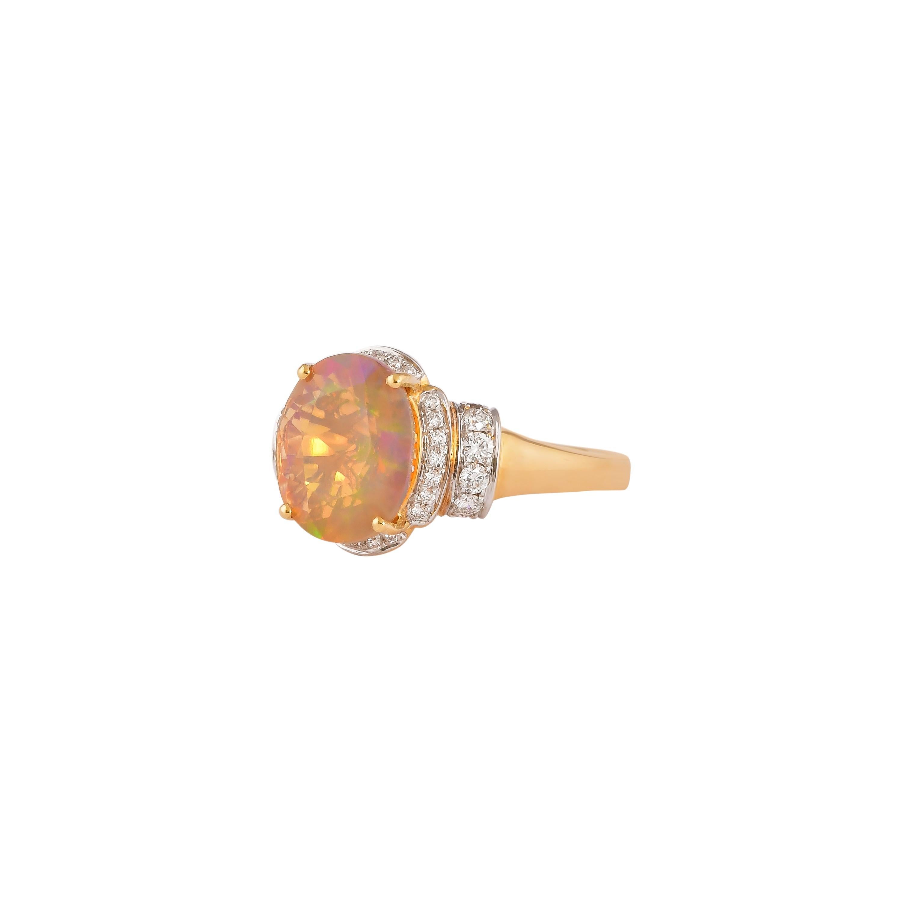 Oval Cut 2.1 Carat Ethiopian Opal with Diamond Ring in 18 Karat Yellow Gold For Sale