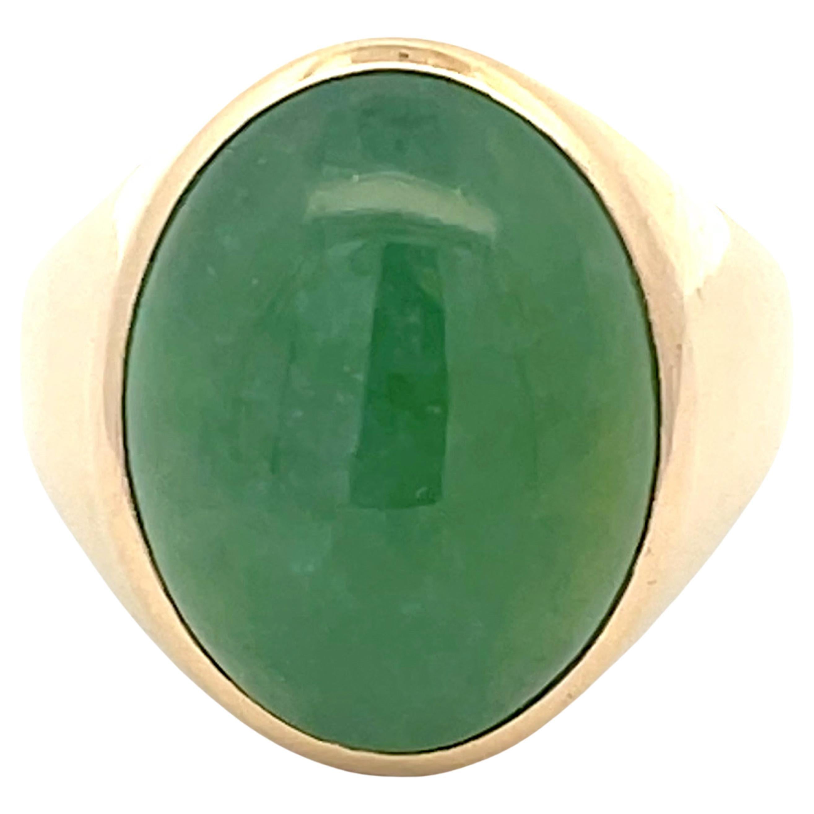 21 Carat Oval Cabochon Green Jade Ring in 14k Yellow Gold For Sale