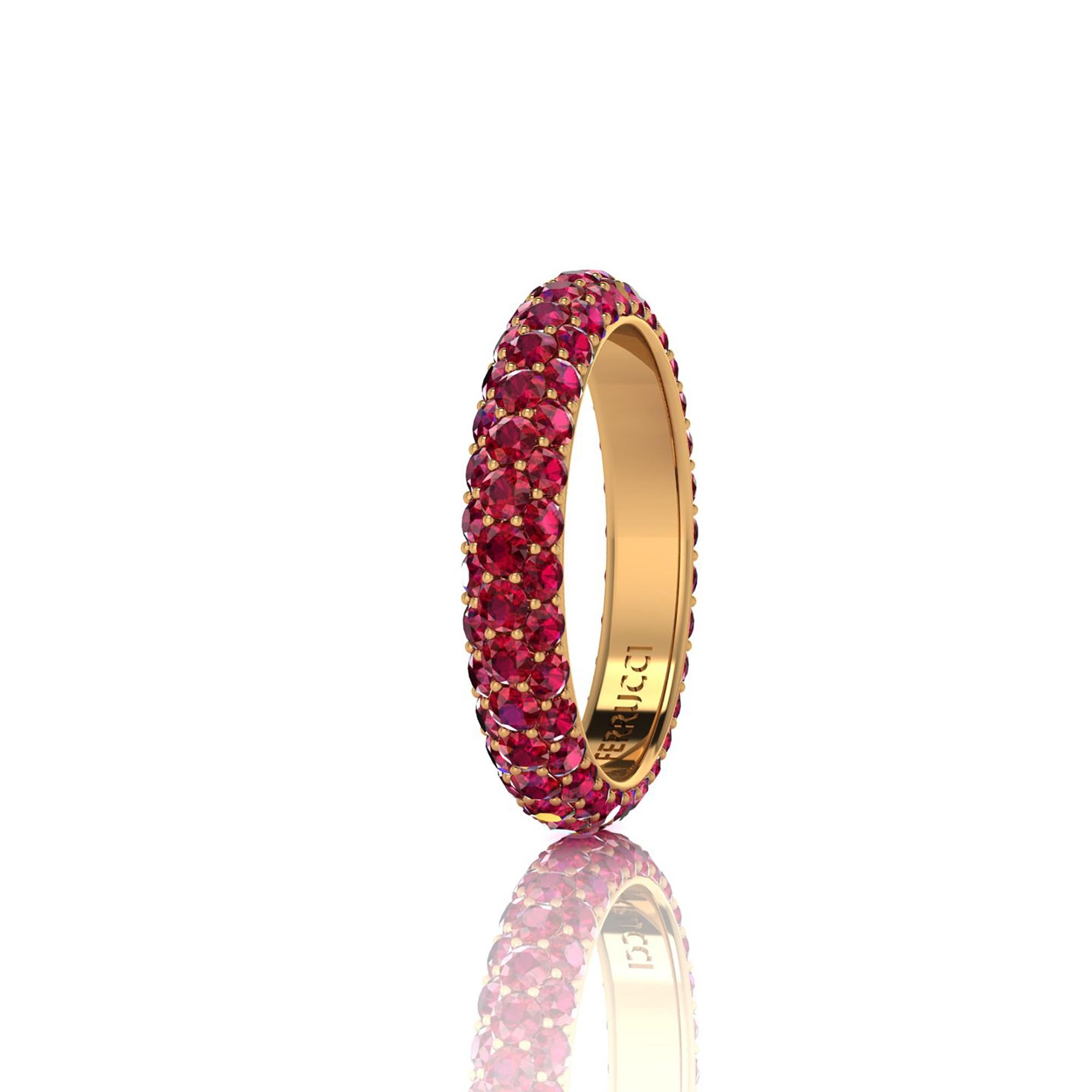  Ruby eternity ring,  an approximate total carat weight of 2 carat, hand made in New York City with the best Italian craftsmanship, conceived in 18k yellow gold.
Classic, sophisticated, gorgeous look, everlasting in time.
This is a Ring size 7 we