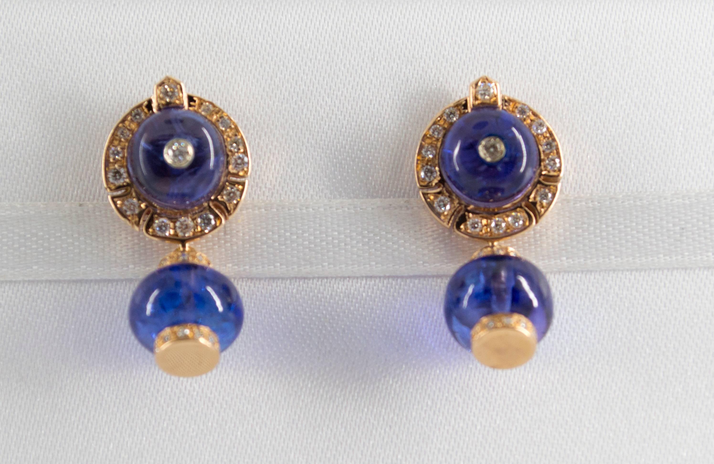 This Earrings are made of 14K Yellow Gold.
This Earrings have 21.00 Carats of Tanzanite.
This Earrings have 0.50 Carats of White Diamonds.
All our Earrings have pins for pierced ears but we can change the closure and make any of our Earrings