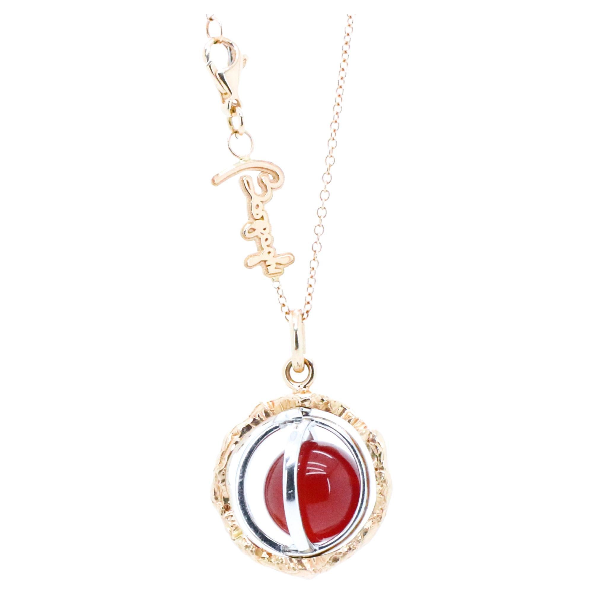 18k Gold Made in Italy Carnelian Changeable Gem Revolving Loops Essence Necklace.
Experience the Wellbeing of Sound and Gemstones with the Sonoro Pendant Necklace.
Unlock Your Divine Potential with the Sonoro pendant. 
Gems and metal are