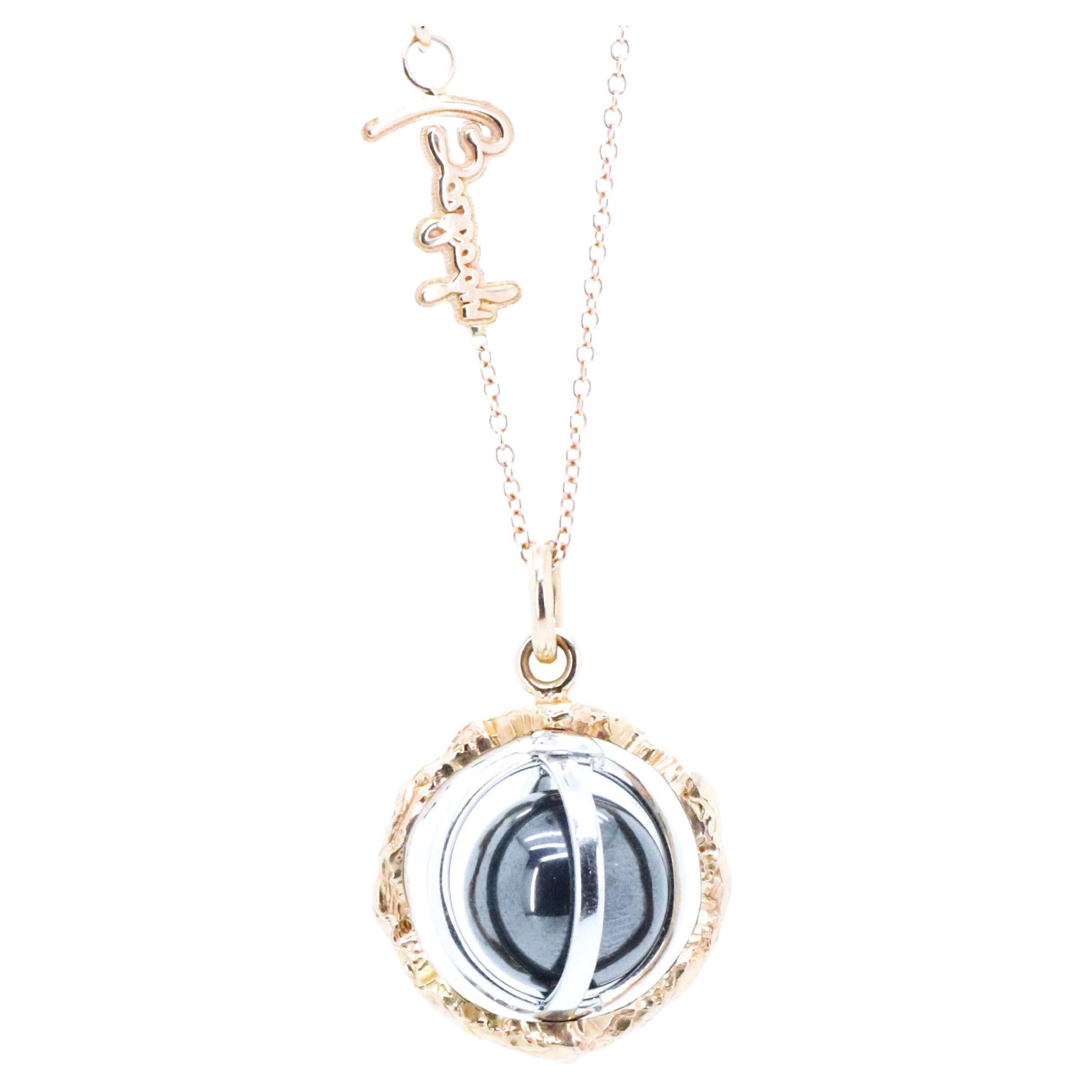 18k Gold Made in Italy Hematite Changeable Gem Revolving Loops Essence Necklace.
Experience the Wellbeing of Sound and Gemstones with the Sonoro Pendant Necklace.
Unlock Your Divine Potential with the Sonoro pendant. 
Gems and metal are
