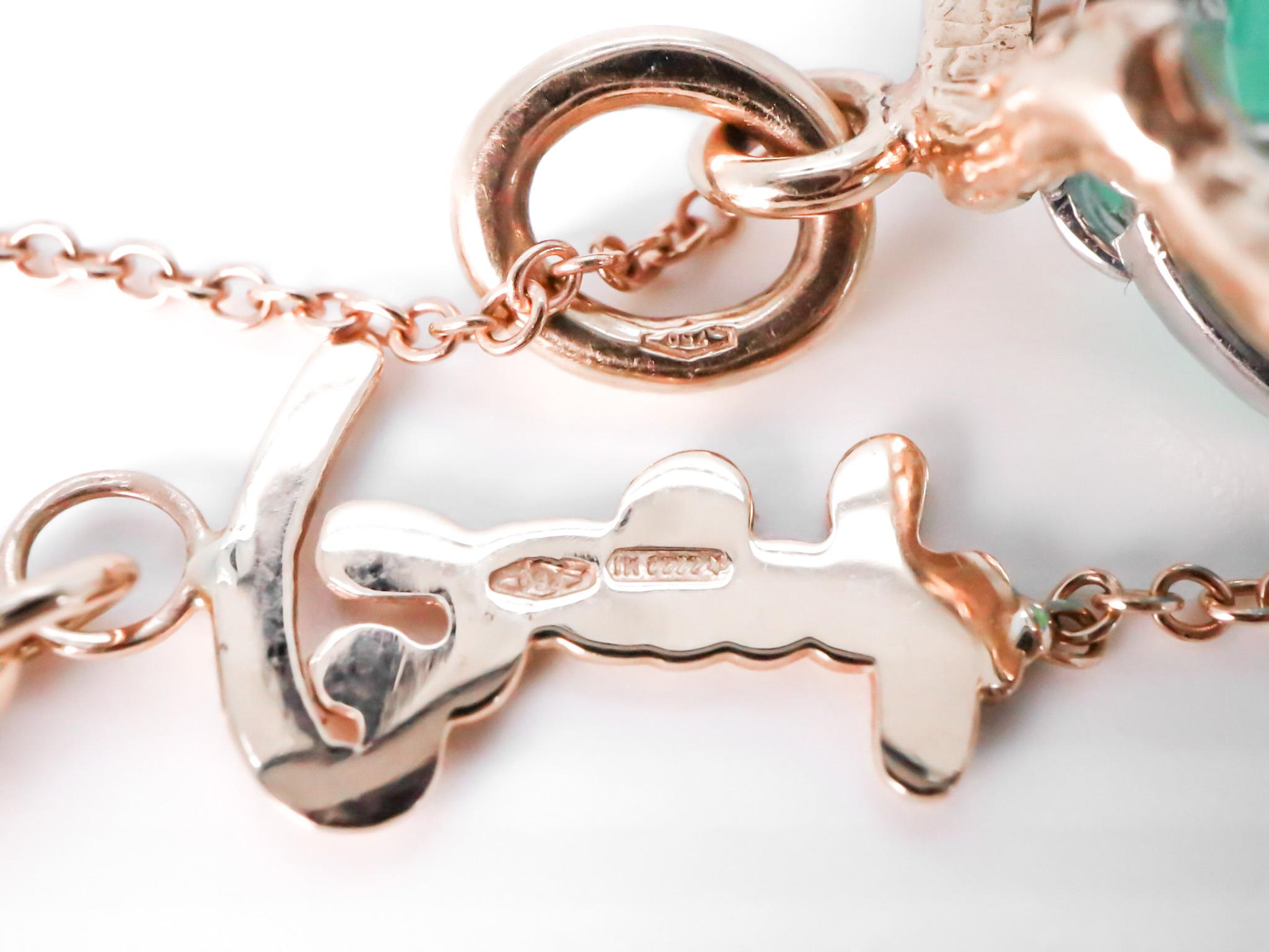 18k Gold Made in Italy Tigerauge Wechselstein Revolving Loops Essenz Halskette für Damen oder Herren im Angebot