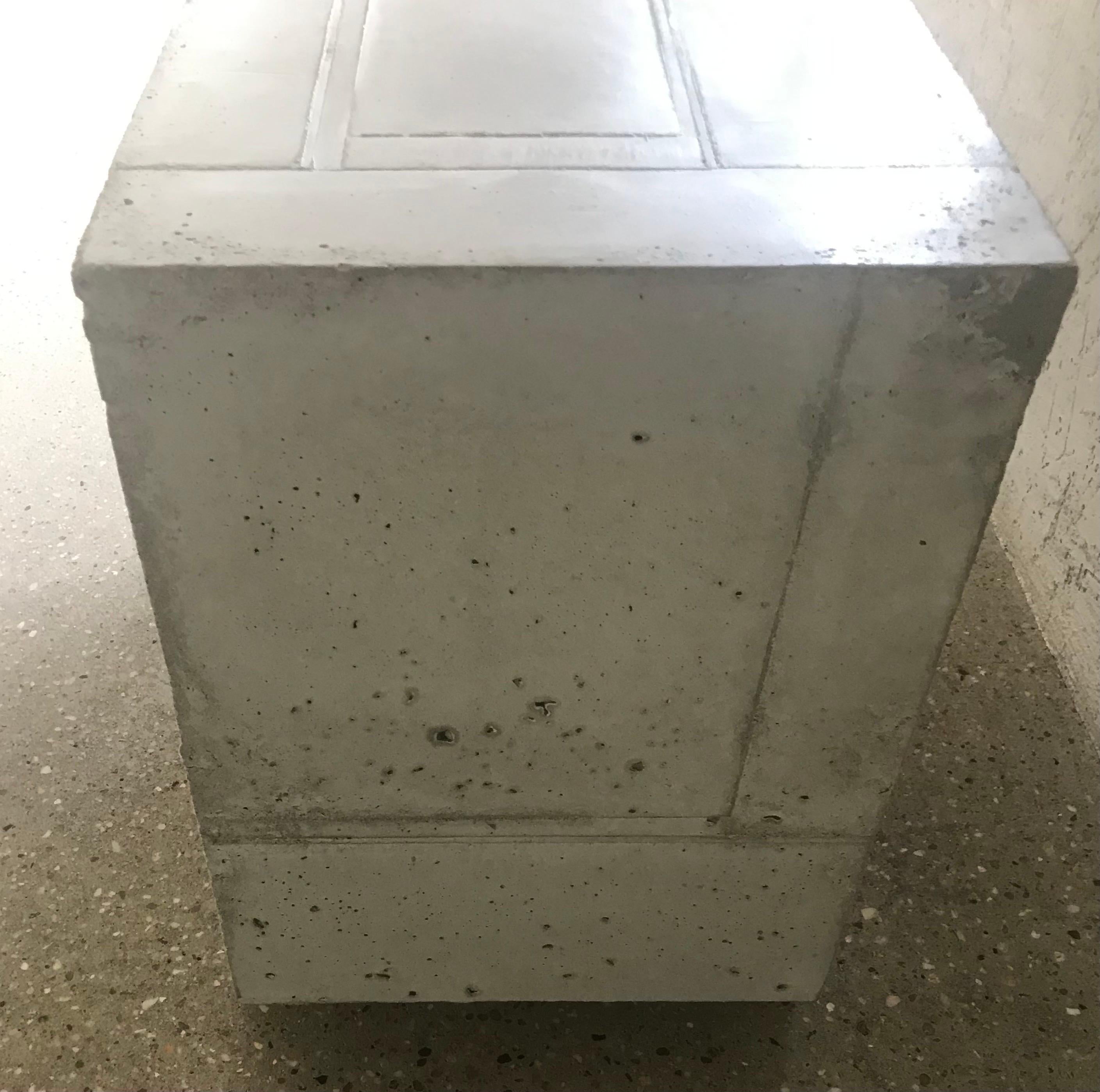 This Chic and Modern Concrete Brutalist style Concrete Side table is bold in its weight and presence. Can be used as an end table or pedestal as well.