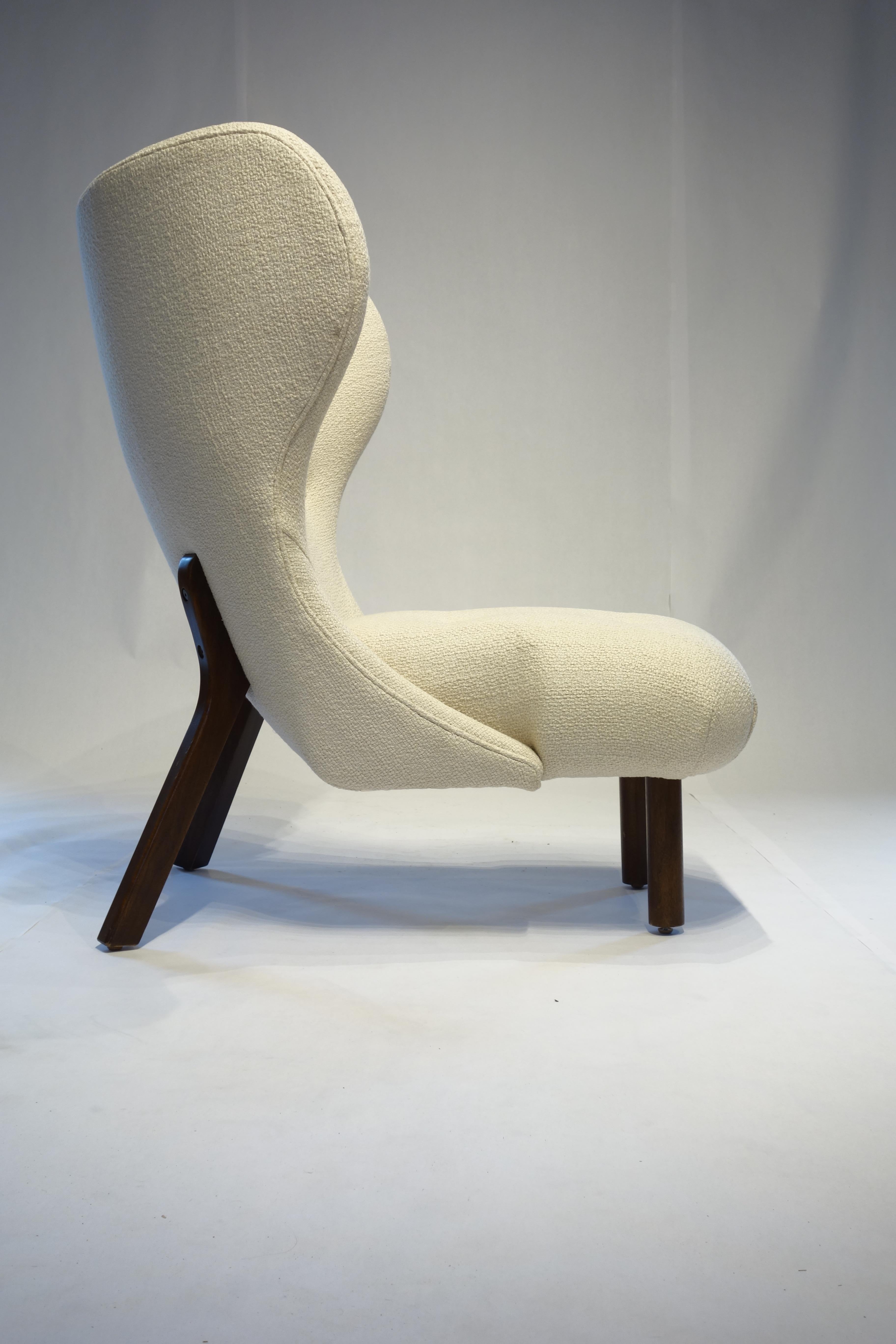 Contemporary Chair with unique details in woven linen made to order.
