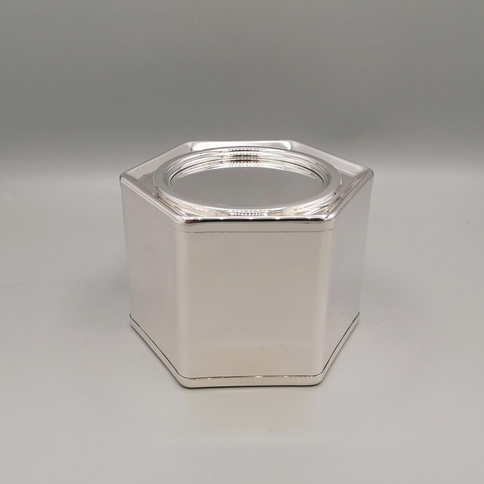 21st century Italian Sterling Silver hexagonal Tea/Caddy Box
Hexagonal sterling silver tea box, 
shaped completely by hand. 
The body has rounded edges and has been left completely smooth. 
Inside the box, a food-grade material interior has been