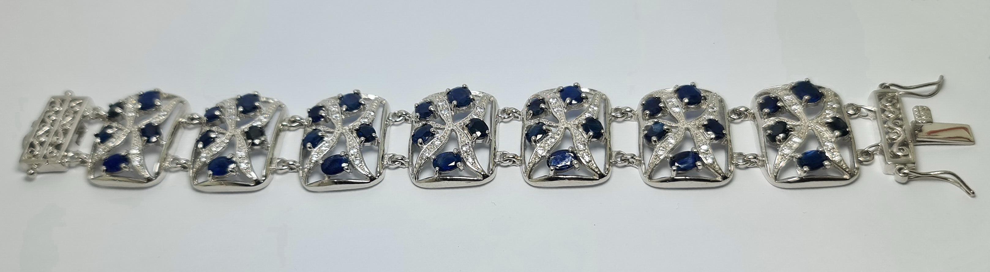 Oval Cut 21 Cts Natural Untreated Sapphire .925 Sterling Silver Rhodium Plated Bracelet For Sale