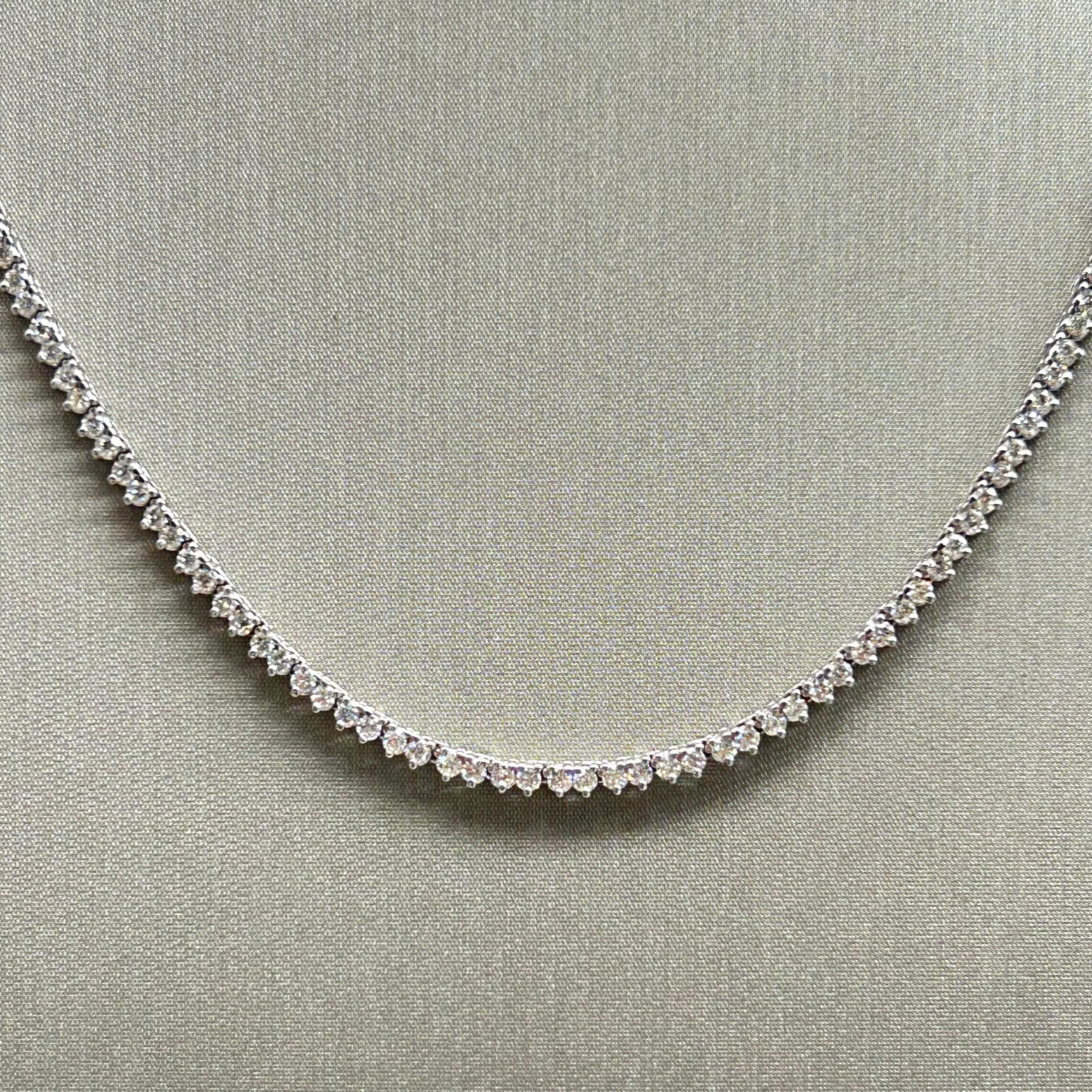 Beautiful white gold tennis necklace with 4.6 tcw of white round brilliant diamonds ( color J-K , Clarity VS ) This necklace is 21” but can be resize . It is a classic piece that gives you and elegant and sleek look. It can be worn in any occassion