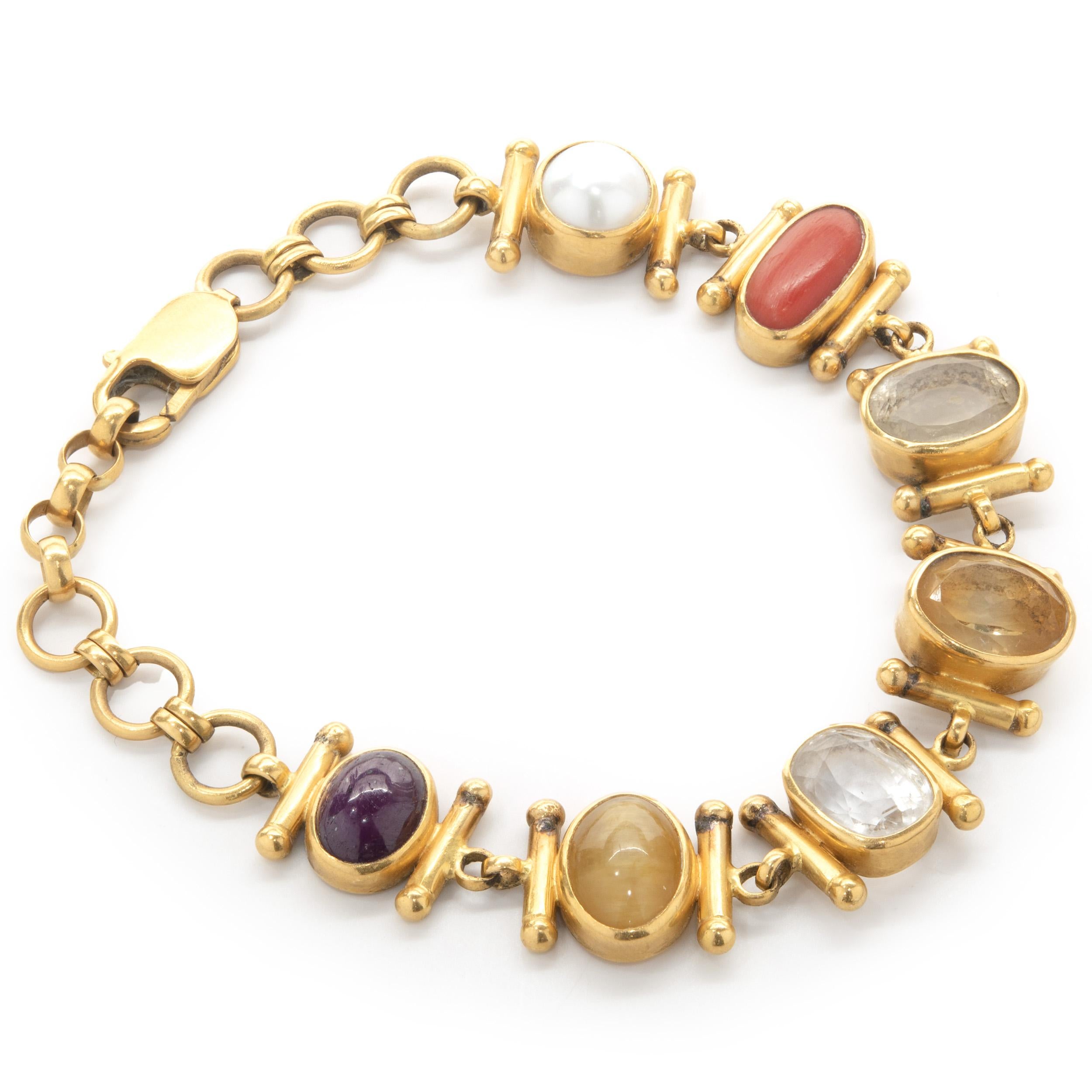 Designer: custom
Material: 21K yellow gold
Weight:  34.20 grams
Dimensions: bracelet will fit an 8.5-inch wrist
