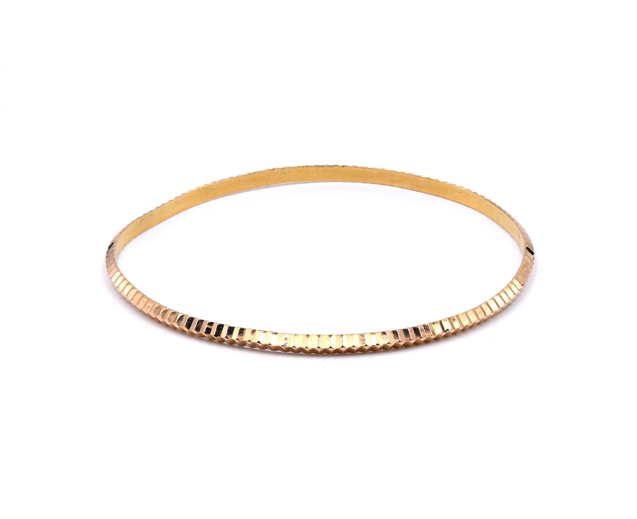 Designer: custom
Material: 21k yellow gold
Dimensions: the bracelet will fit up to a 8-inch wrist
Weight: 9.45 grams
