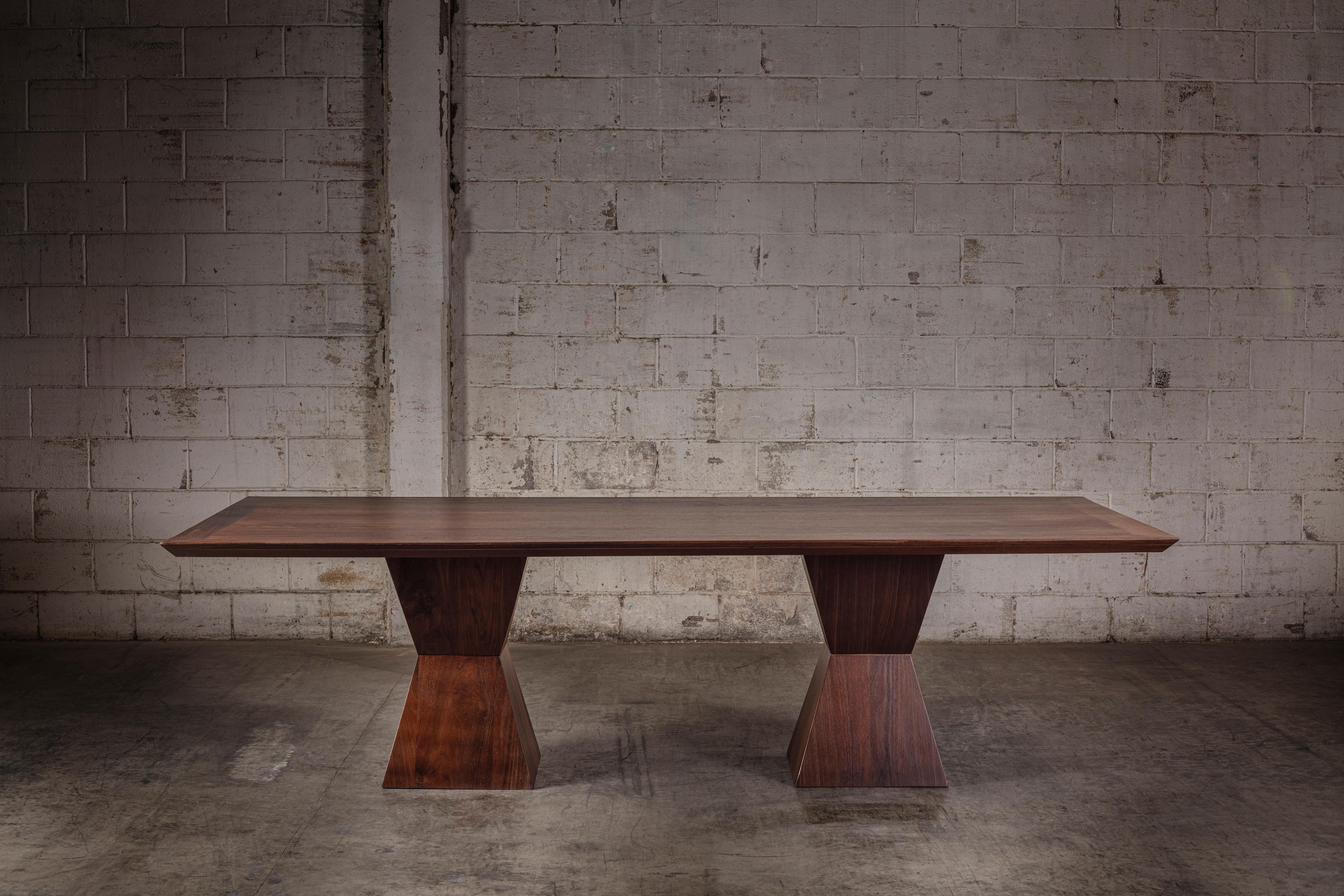 21 Rectangular Dining Table in Solid Walnut by No Age Studio
Dimensions: D 114.3 x W 215.9 x H 76.2 cm. 
Materials: Walnut.

No Age Studio - Handcrafted Furniture

Every piece we create is made to order, crafted with care and precision to meet your