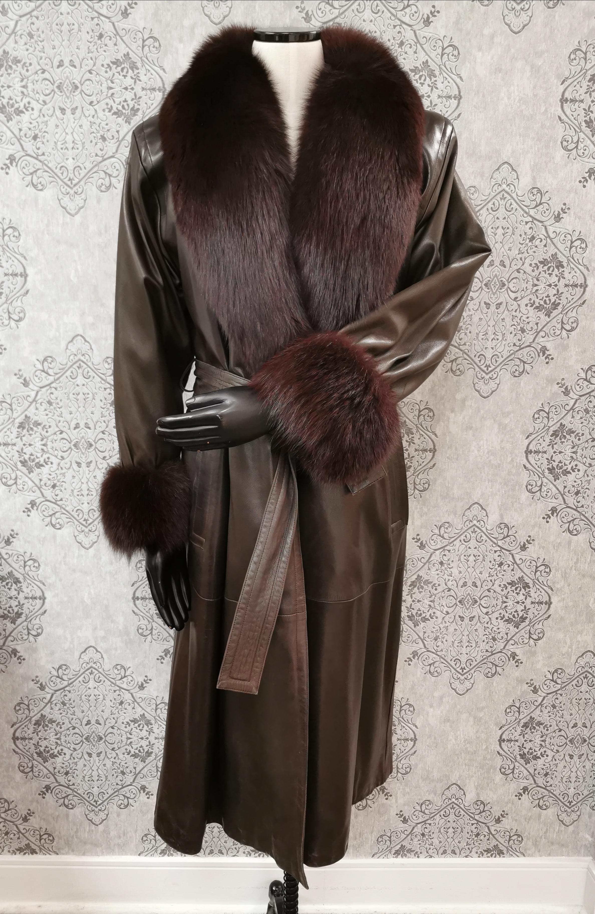PRODUCT DESCRIPTION:

gorgeous design Yves Saint Laurent Fourrures Lambskin Coat with Shadow Fox Fur trim for the collar and cuffs and sheared beaver lining and a leather belt

Condition: Pristine

Closure: Buttons and belt

Color: Carob brown and