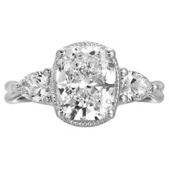 2.10 Carat Cushion Diamond set in a 14k White Gold Three Stone Engagement Ring