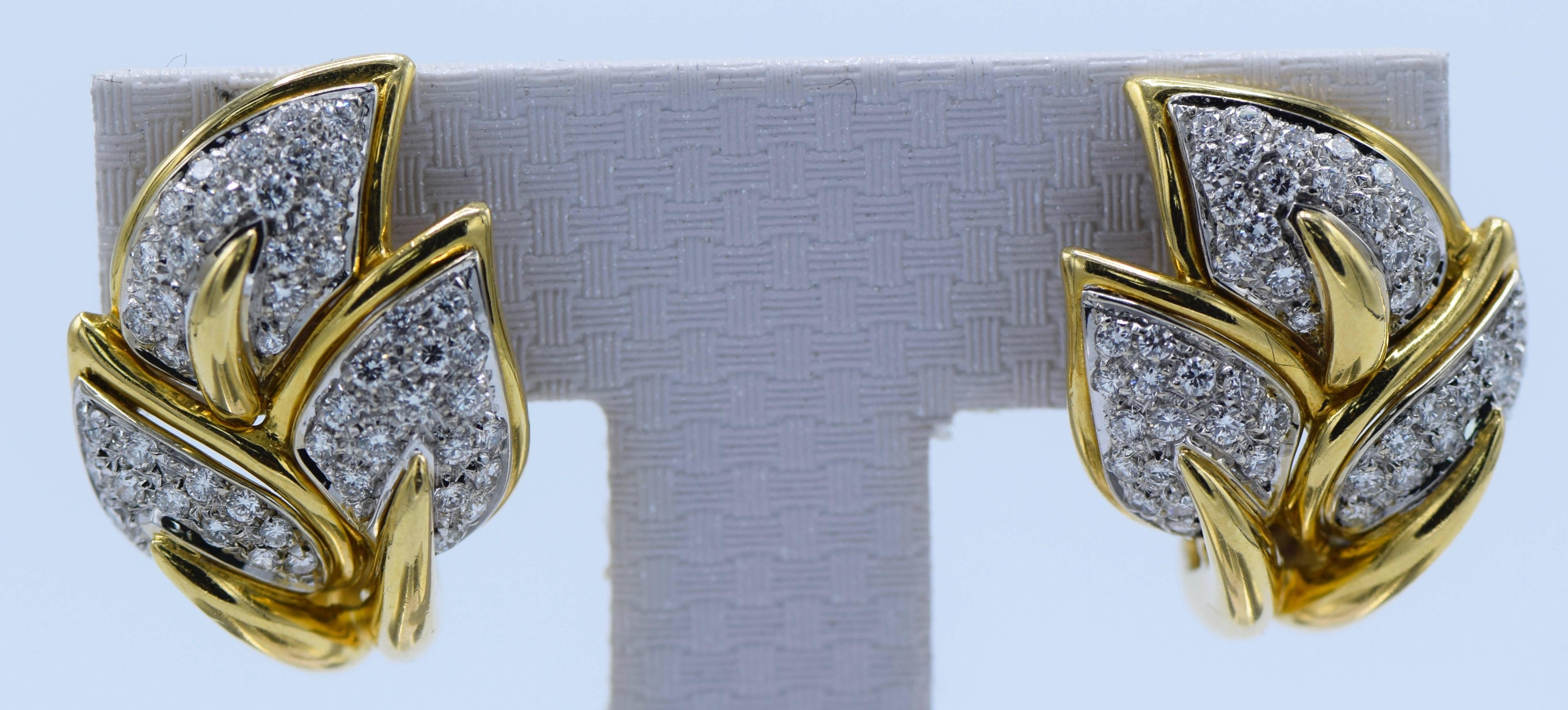 18 kt. yellow & white gold, 106 round diamonds ap. 2.10 cts., signed Italy, ap. 12.3 dwts.

Diamonds: F-G-VS. 

Posts & clip-backs. 1 x 3/4 inch. 
