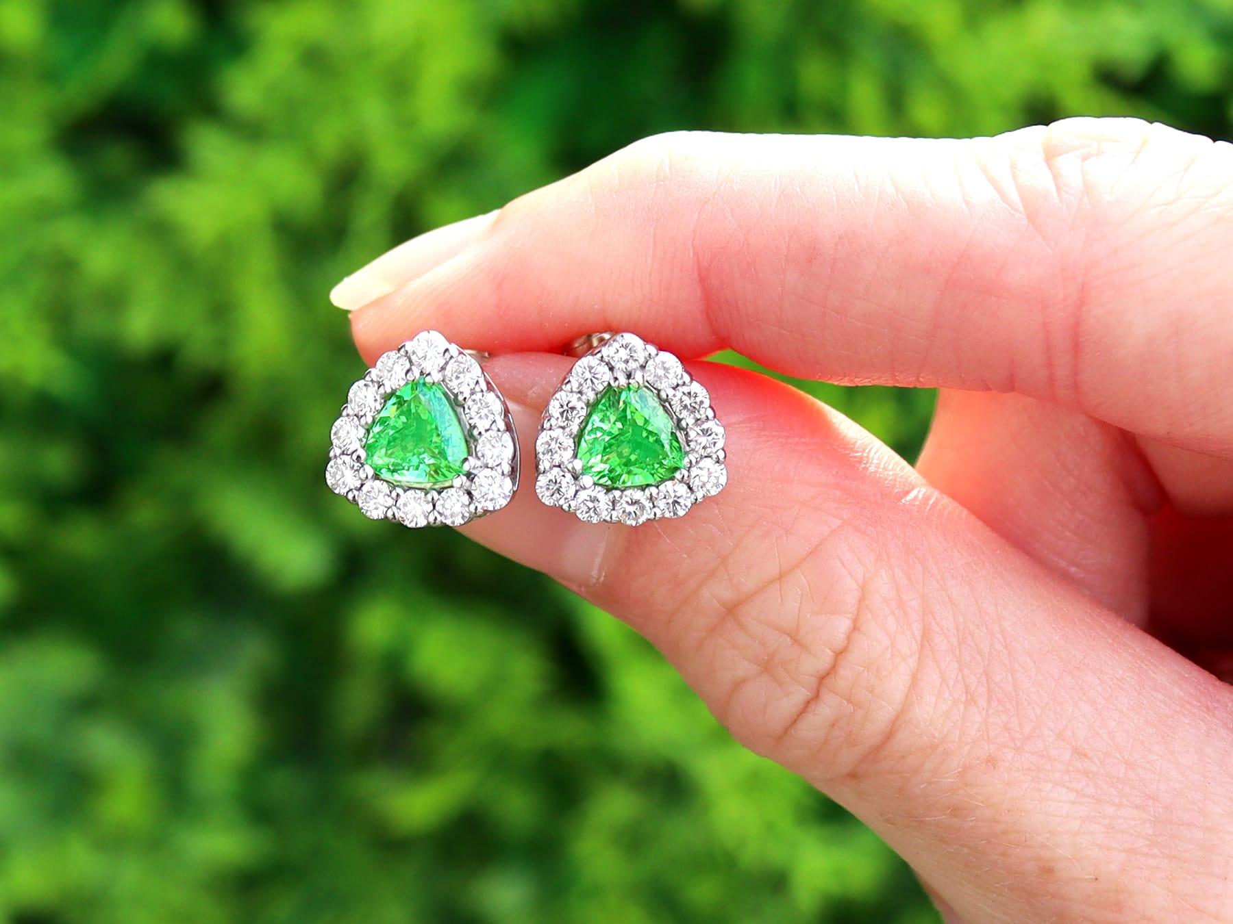 A fine and impressive pair of vintage 2.10 carat hydrogrossular/green garnet and 0.88 carat diamond, 18 karat white gold earrings; part of our diverse vintage jewellery collections

These fine and impressive vintage earrings have been crafted in 18k