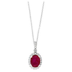 2.10 Carat Oval Cut Ruby and Diamond Halo Pendant Necklace in 18K White Gold