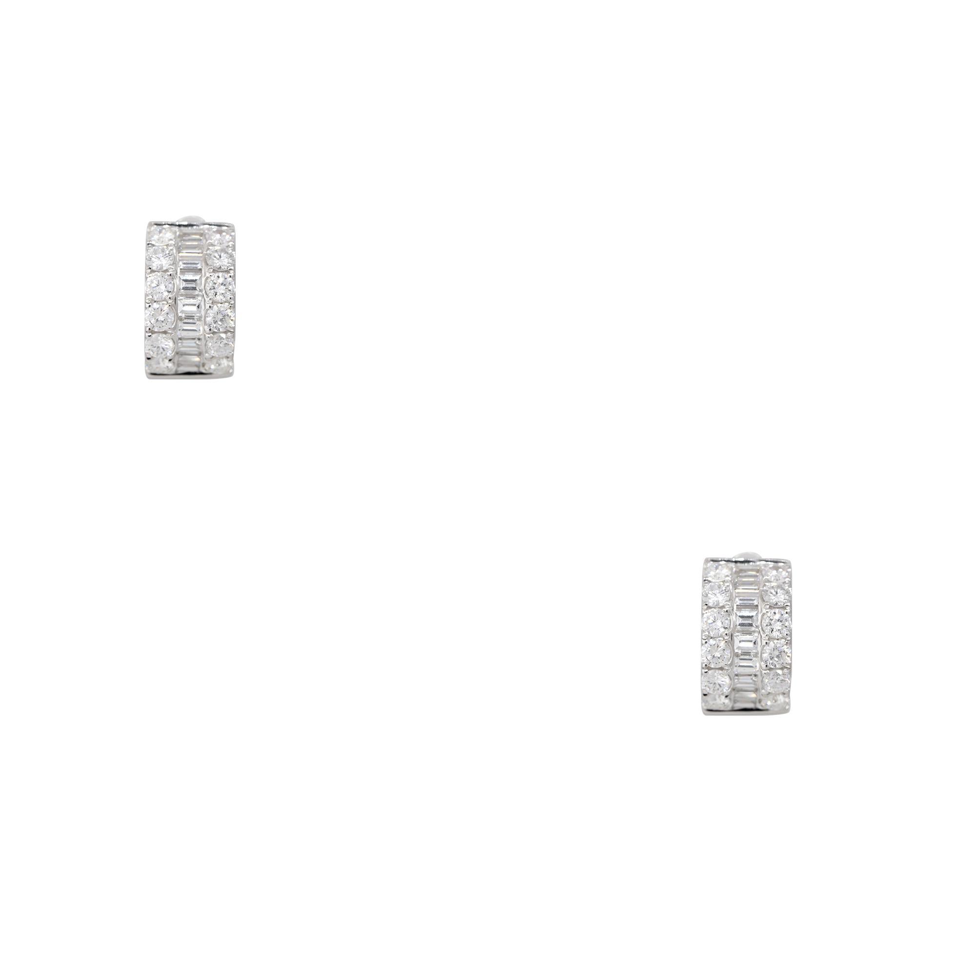 18k White Gold 2.10ctw Round Brilliant & Baguette Diamond Mini Huggie Hoop Earrings
Material: 18k White Gold
Diamond Details: There are approximately 2.10 carats of round brilliant and baguette-cut diamonds. All diamonds are approximately F/G in
