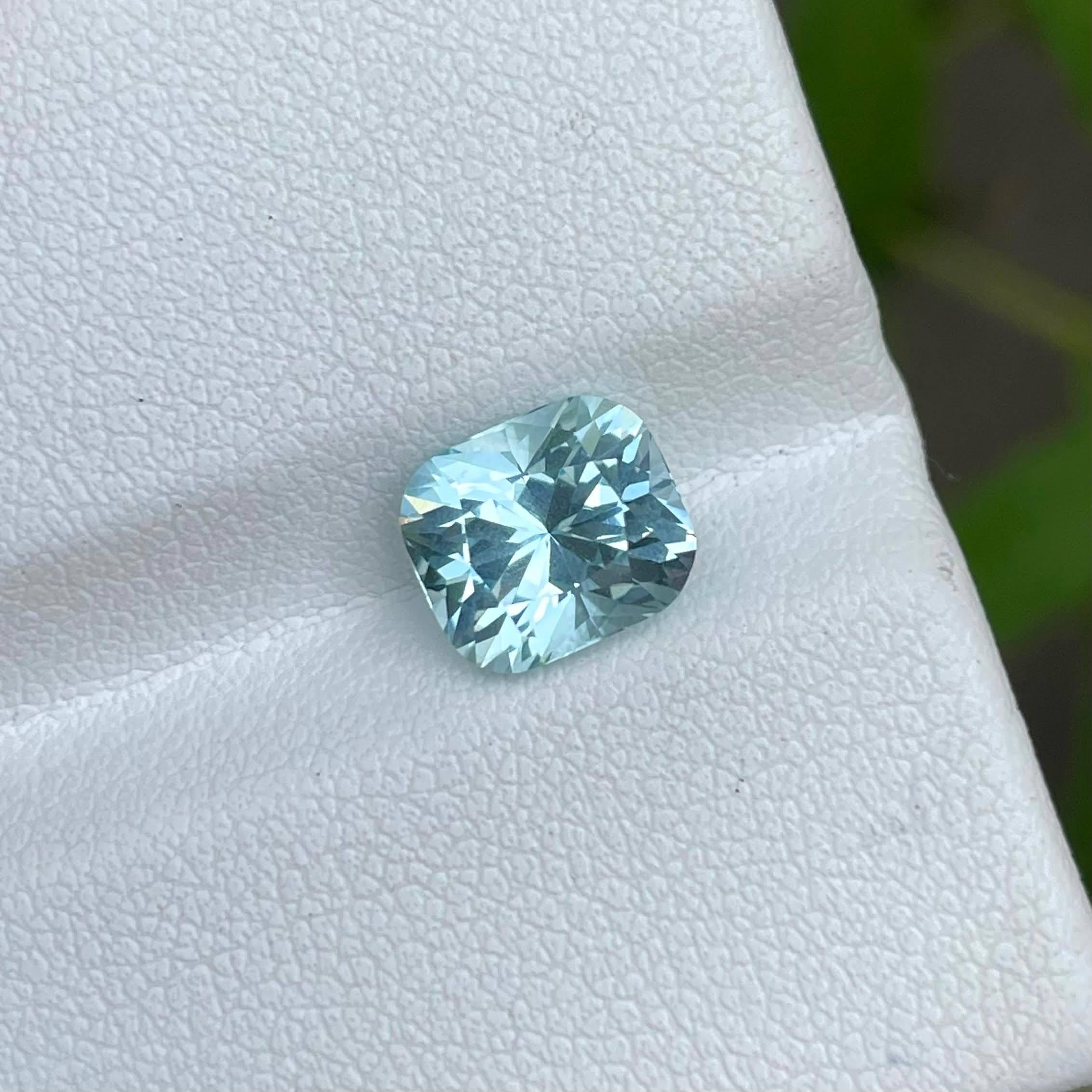 Weight 2.10 carats 
Dimensions 8.12x7.10x5.98 mm
Treatment none 
Origin Nigeria 
Clarity eye clean 
Shape cushion 
Cut custom precision 




This exquisite gemstone boasts a captivating 2.10 carat Aquamarine of unparalleled quality, sourced from the