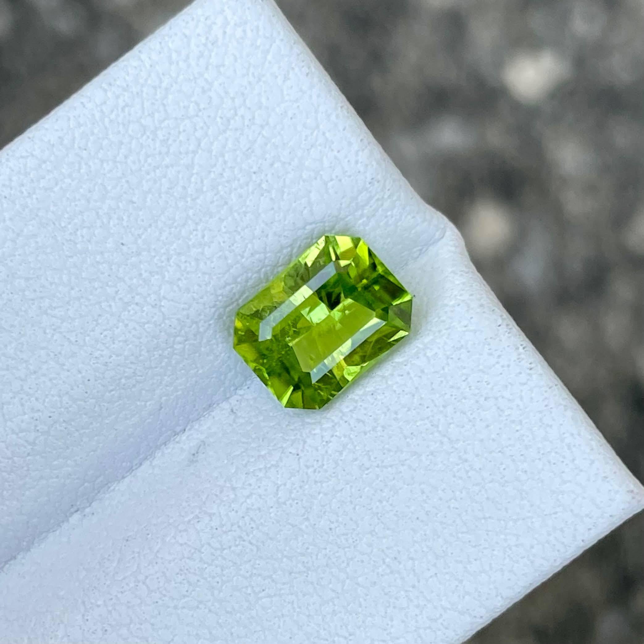 Weight 2.10 carats 
Dimensions 8.23x6.38x4.65 mm 
Treatment none 
Origin Pakistan 
Clarity included 
Shape octagon 
Cut custom Precision



Behold the mesmerizing beauty of a 2.10 carat Apple Green Peridot Stone, expertly crafted into an custom