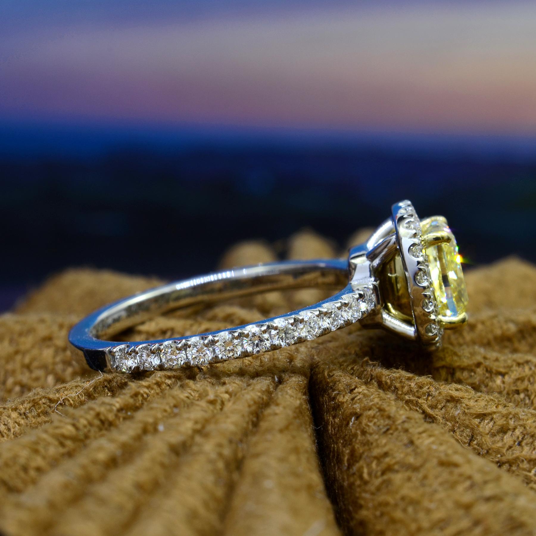 2.10ct. Halo Fancy Light Yellow Canary Cushion Cut with Halo Diamond Ring VS1 In New Condition For Sale In Los Angeles, CA