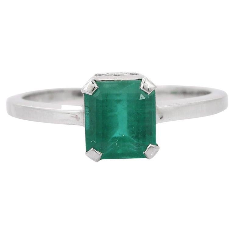 For Sale:  2.10 CTW Natural Octagon Cut Emerald Solitaire Ring in 18k White Gold 9