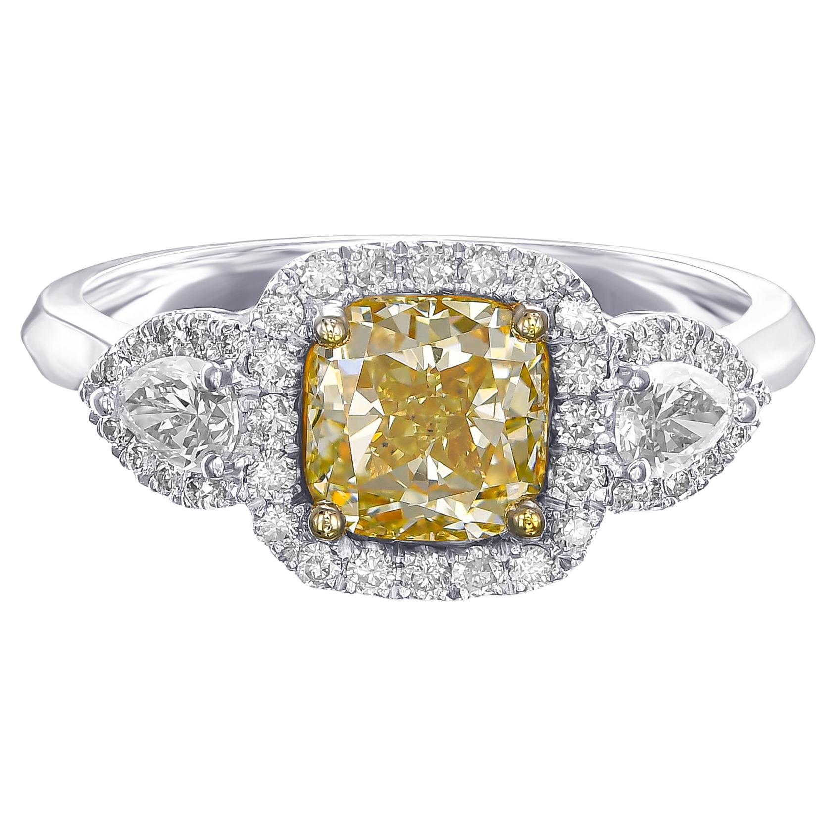 Today we are offering this amazing 2.10 total carat weight Fancy Light Yellow diamond engagement ring.

A natural 1.50 carat diamond main stone, accented with 0.60 total carat weight of white diamonds - a once in a lifetime opportunity to become the