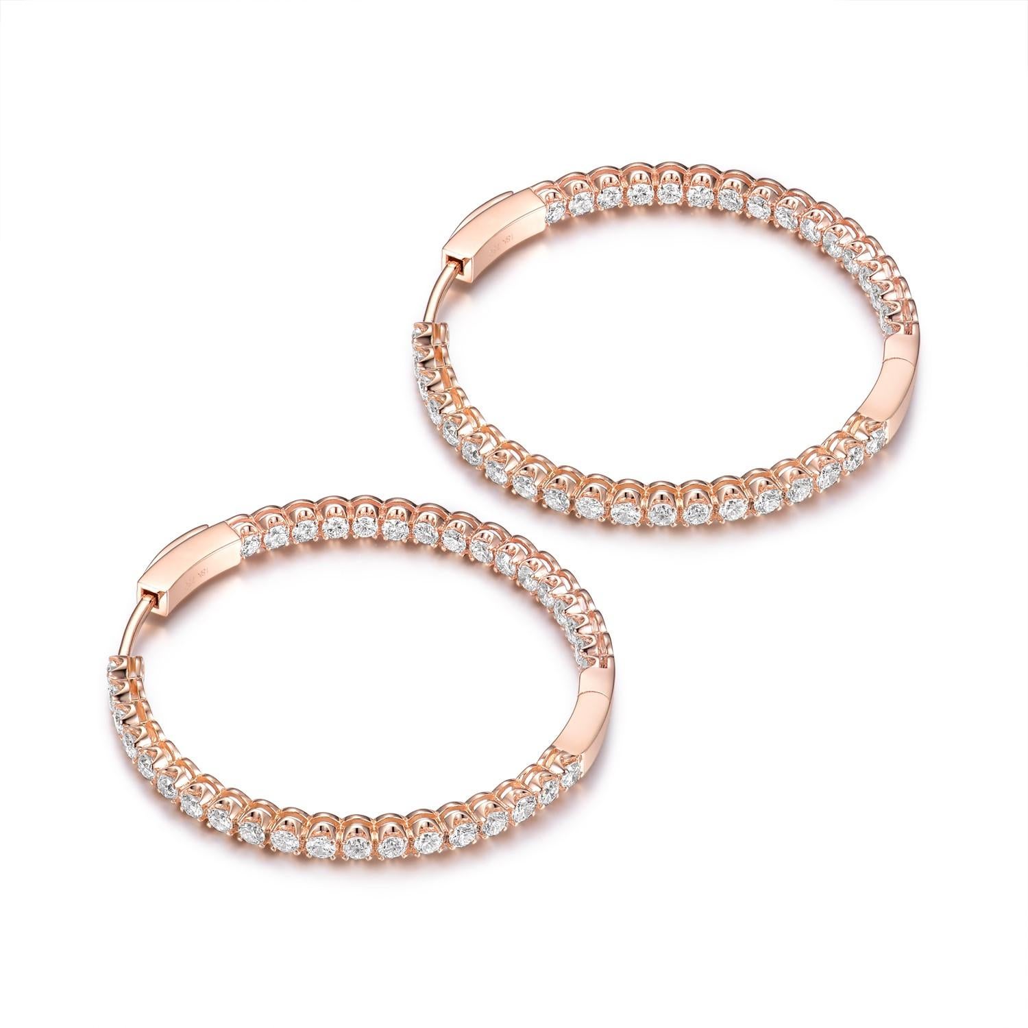 Embrace timeless elegance with our 2.10 Total Carat Diamond Hoop Earrings set in 18 Karat Rose Gold. These stunning earrings seamlessly blend the ageless allure of diamonds with the modern sophistication of rose gold, making them a perfect addition