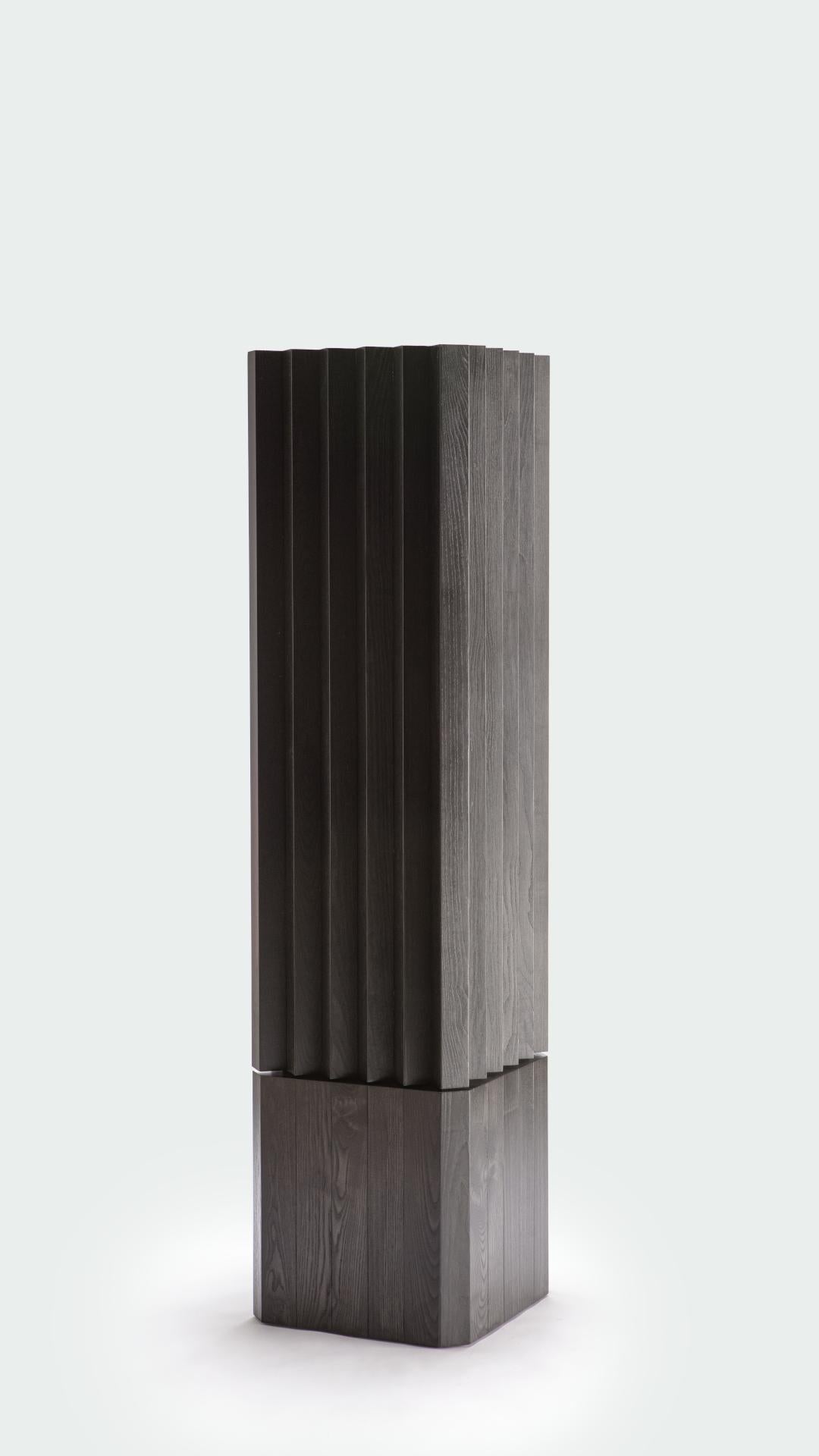 210 Wood Column with Lacquered Interiors by Cara Davide
Dimensions: D 51 x W 51 x H 210 cm 
Materials: Solid wood on multilayer structure, 10mm extra-clear tempered glass shelves, with lacquered interiors.
Colors: Ash with aniline finish,