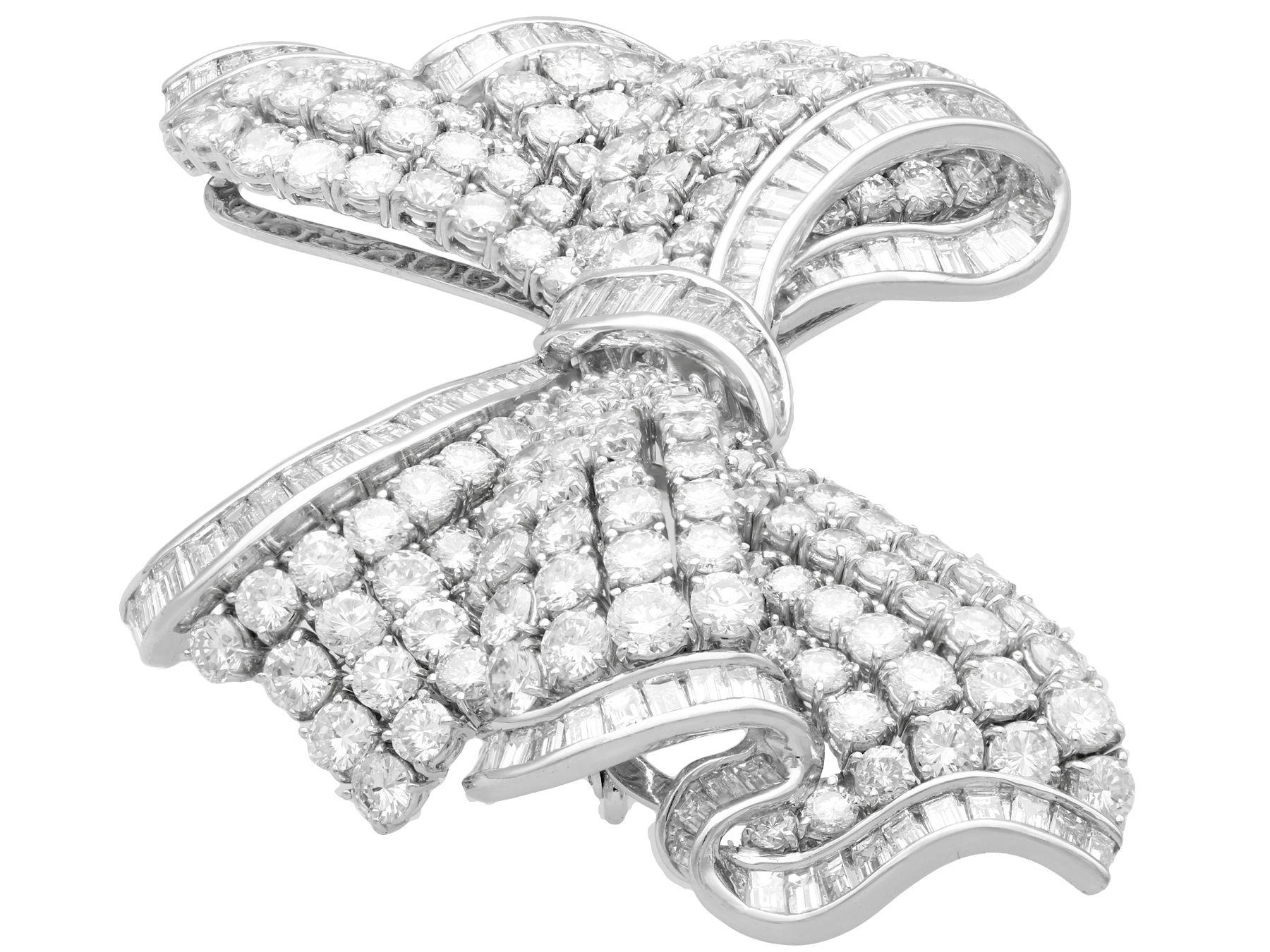 Round Cut 21.04 Carat Diamond and Platinum Bow Brooch For Sale