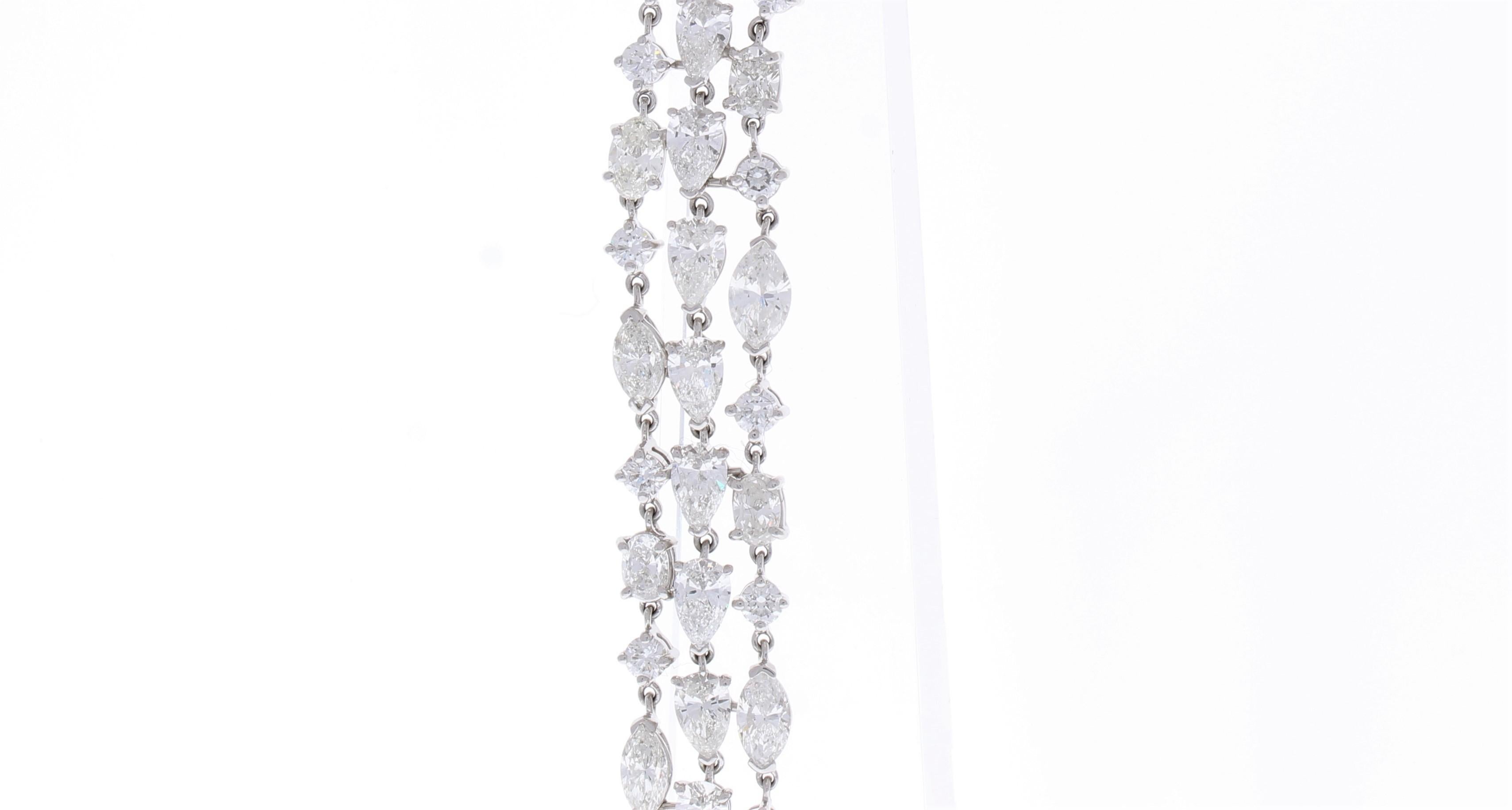 Contemporary 21.05 Carat Total Weight 3 Rows of Fancy Shaped Diamond Bracelet In White Gold For Sale