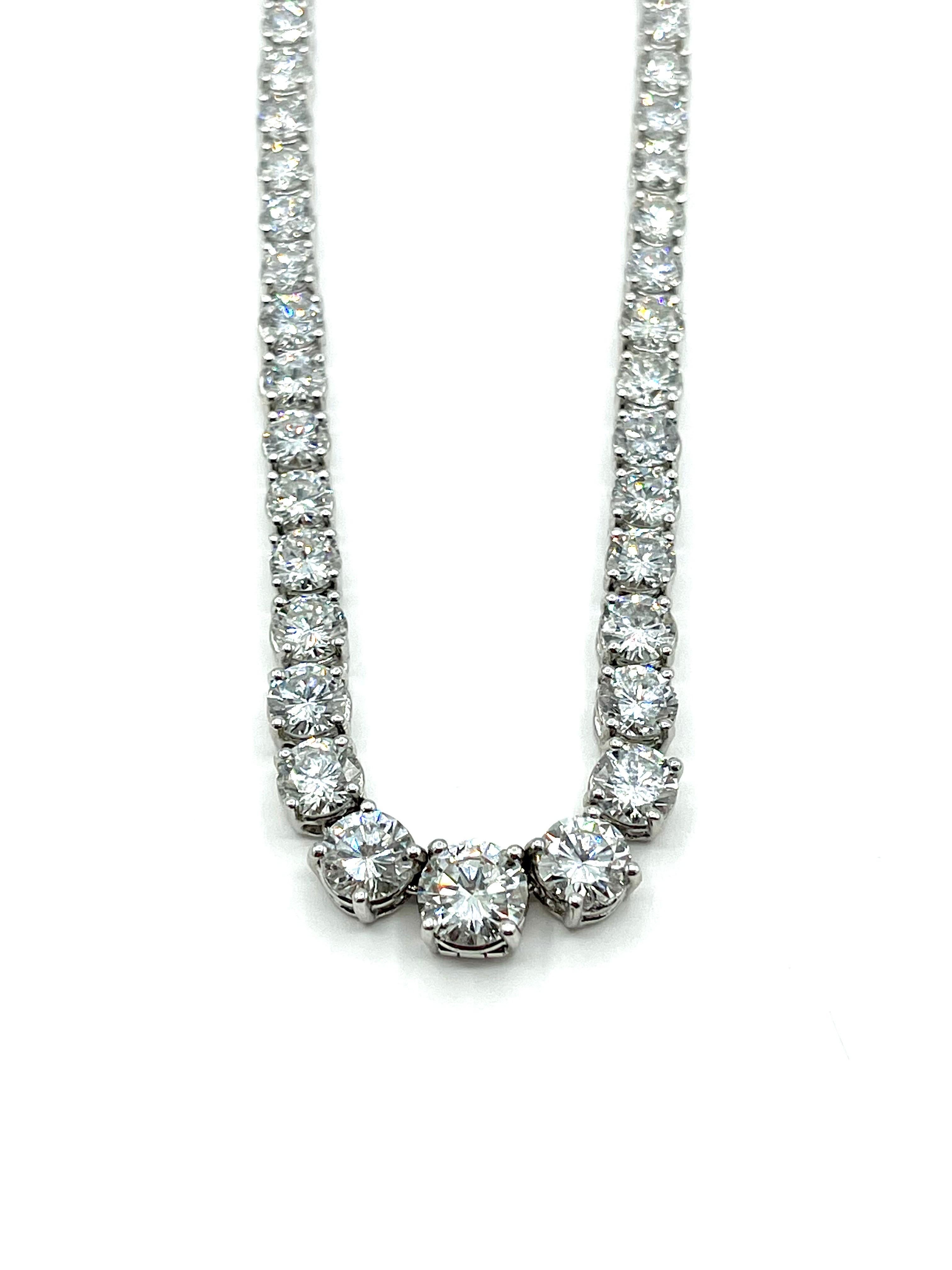 This necklace is amazing!  There is a total of 20.41 carats in round brilliant Diamonds, attached with a bow style clasp containing 0.65 carats in baguettes and marquise shaped Diamonds.  The Diamonds graduate from the back to the center of the