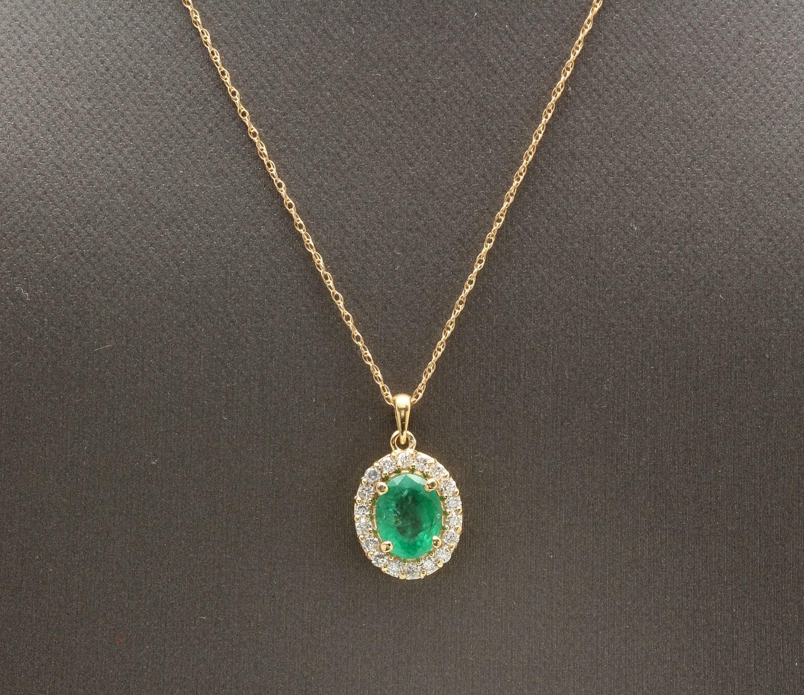2.10Ct Natural Emerald and Diamond 14K Solid Yellow Gold Necklace

Amazing looking piece! 

Stamped: 14K

Suggested Replacement Value: $4,500.00 

Natural Emerald Weights: Approx. 1.70 Carats

Emerald Treatment: Oiling

Emerald Measures: Approx.