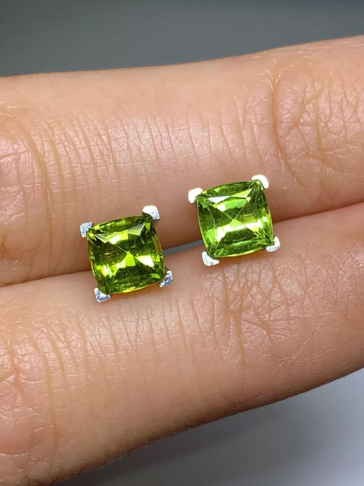 Emerald Cut 2.10ct Peridot green cushion stud earrings in 18ct white gold. For Sale