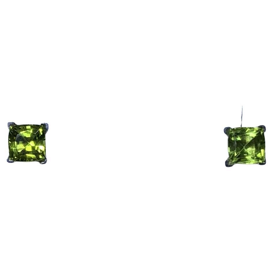 2.10ct Peridot green cushion stud earrings in 18ct white gold. For Sale