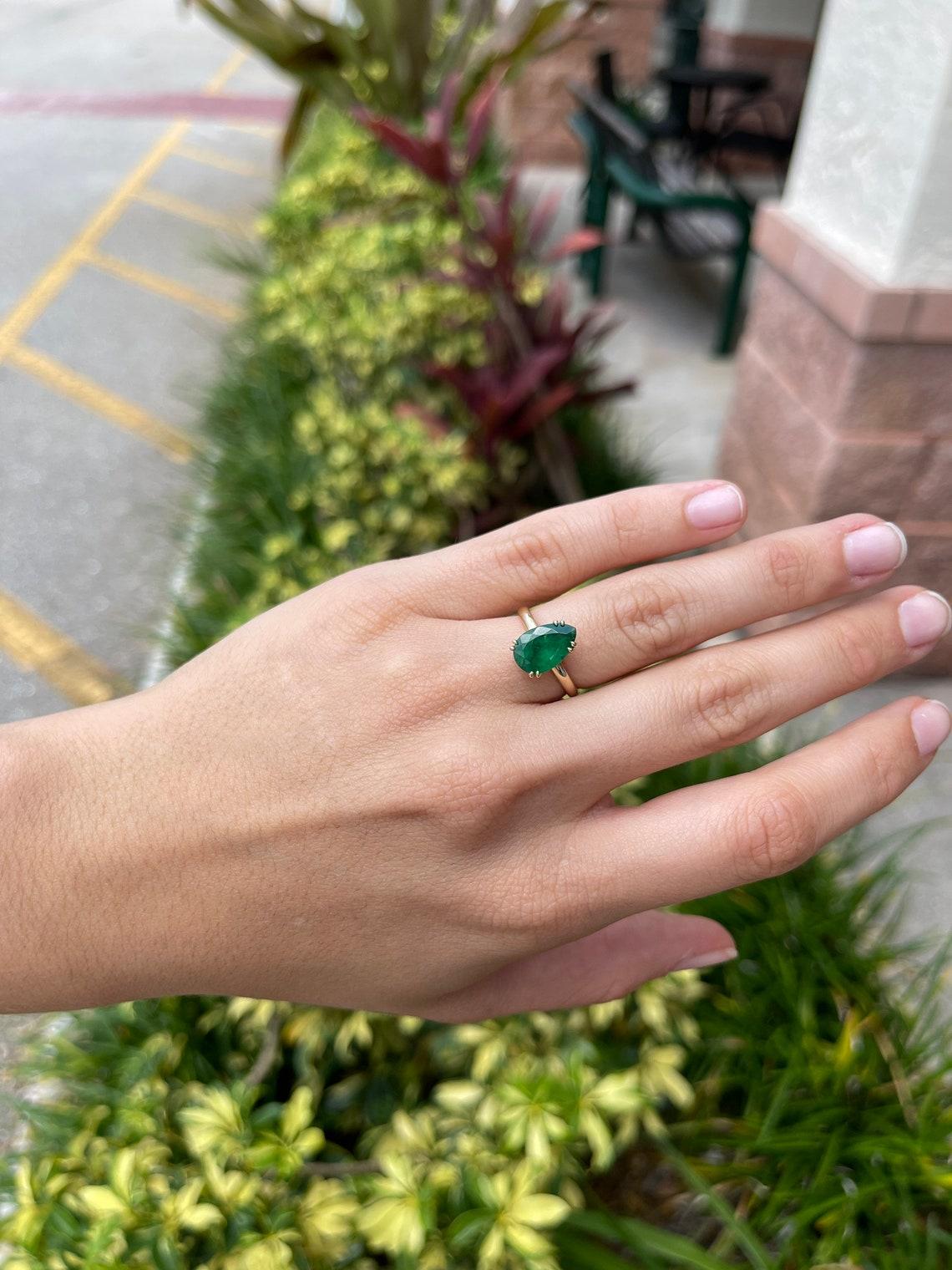 emerald on gold band