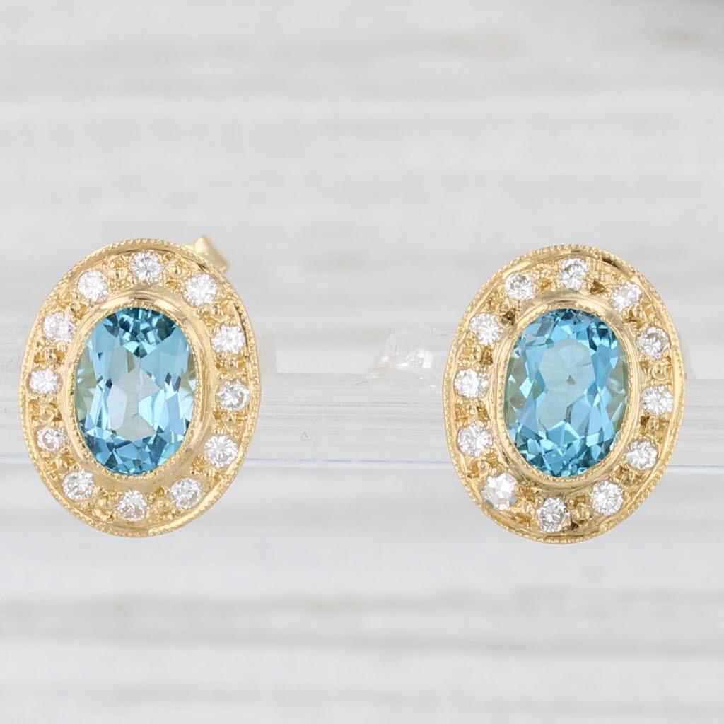 Donna Orecchini a perno con diamante e topazio blu ovale da 2,10 carati in oro giallo 18 carati in vendita