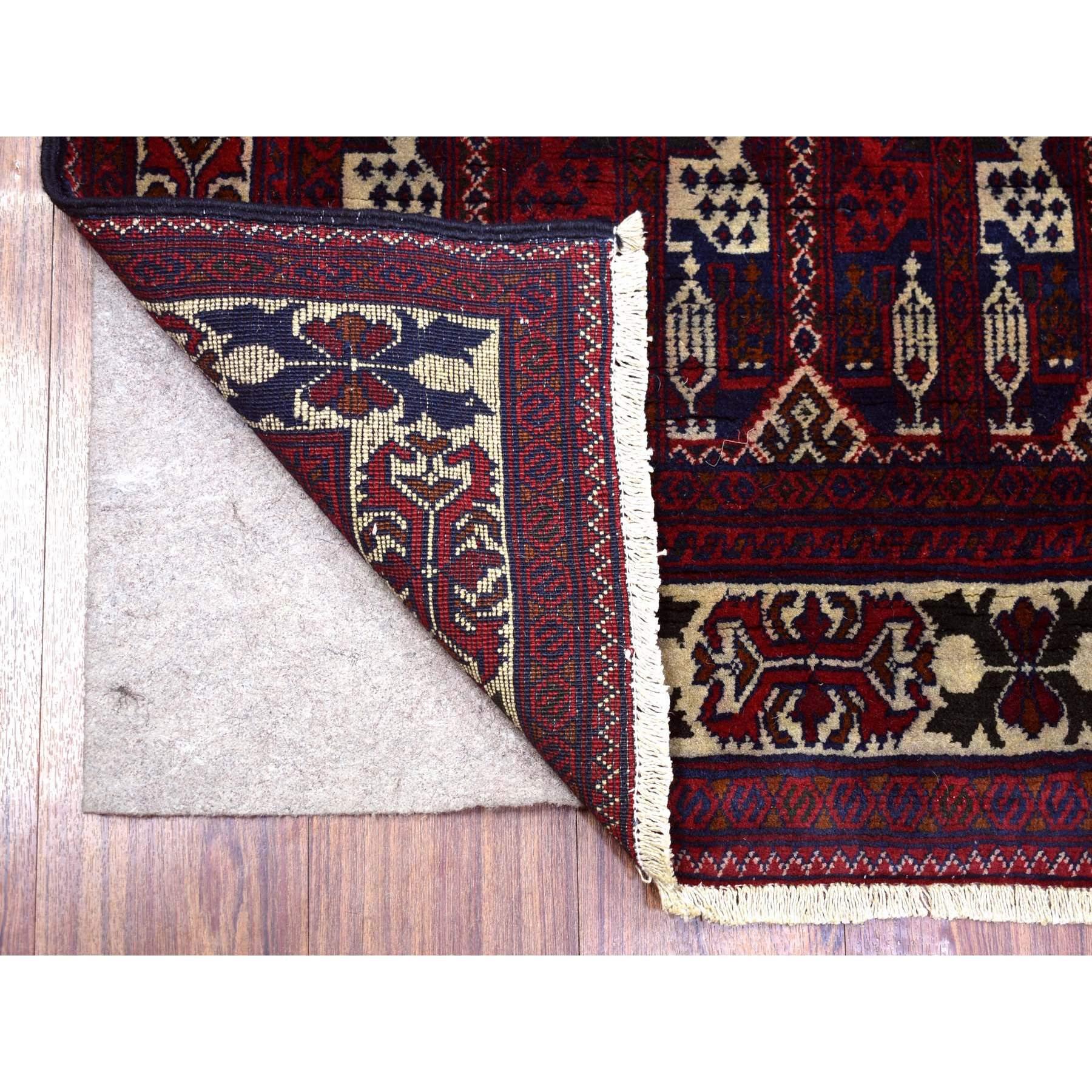 This is a truly genuine one-of-a-kind Deep Red With Mix Of Ivory Soft and Shiny Wool, Hand Knotted With Geometric Repetitive Afghan Khamyab Runner Oriental Rug. It has been Knotted for months and months in the centuries-old weaving craftsmanship