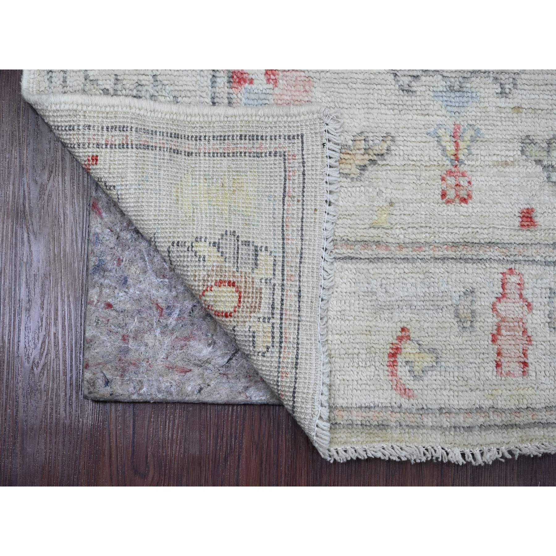 Cloud Gray, Afghan Angora Oushak with Colorful Leaf Design, Natural Dyes, Hand Knotted, 100% Wool, Runner, Oriental Rug
Primary materials: Wool
Latex: No Pile 
height: 0.25 Inches
Style: Transitional
Primary color: Grey
Secondary colors: Red,