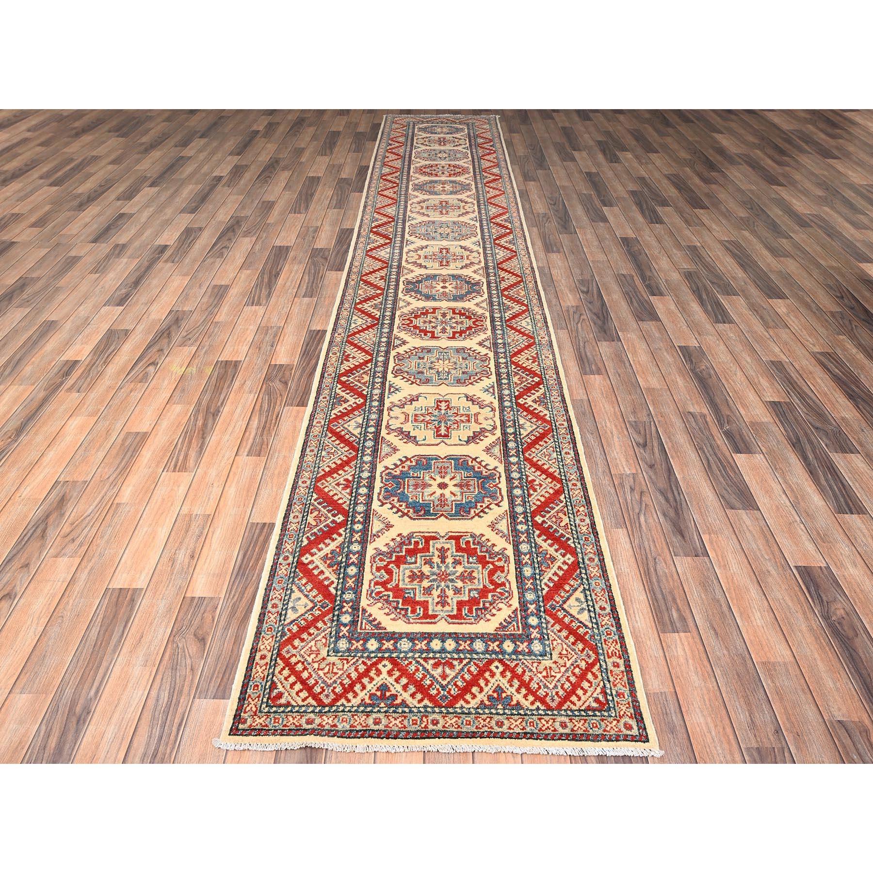 Almond Milk White, Hand Knotted, Pure Wool, Vegetable Dyes, Denser Weave, Kazak with Geometric Medallions Design, XL, Runner, Oriental Rug
Primary materials: Wool
Latex: No Pile 
height: 0.25 Inches
Style: Traditional
Primary color: Ivory
Secondary