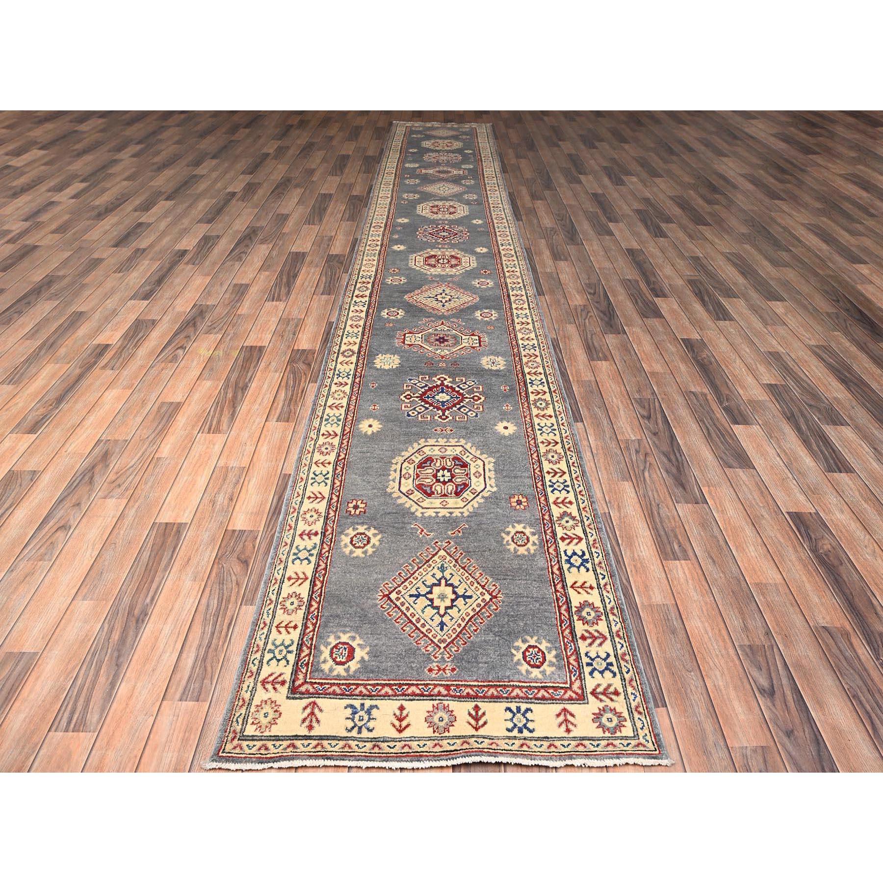 Misty Gray, Vegetable Dyes, Denser Weave, Kazak with Geometric Medallions Design, Hand Knotted, Pure Wool, XL, Runner, Oriental Rug
Primary materials: Wool
Latex: No Pile 
height: 0.25 Inches
Style: Traditional
Primary color: Grey
Secondary colors: